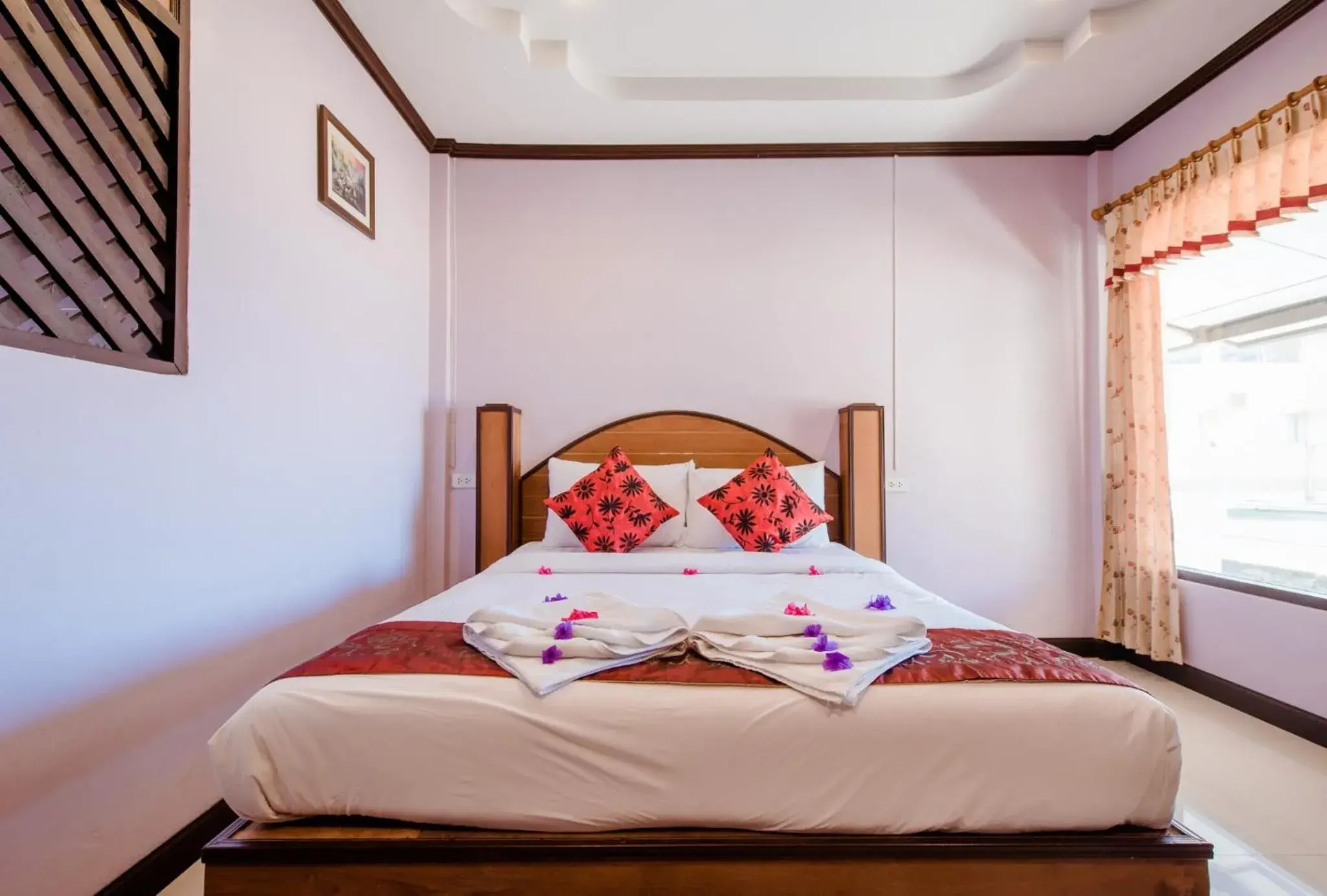 Bed in Baan Rabieng Resort