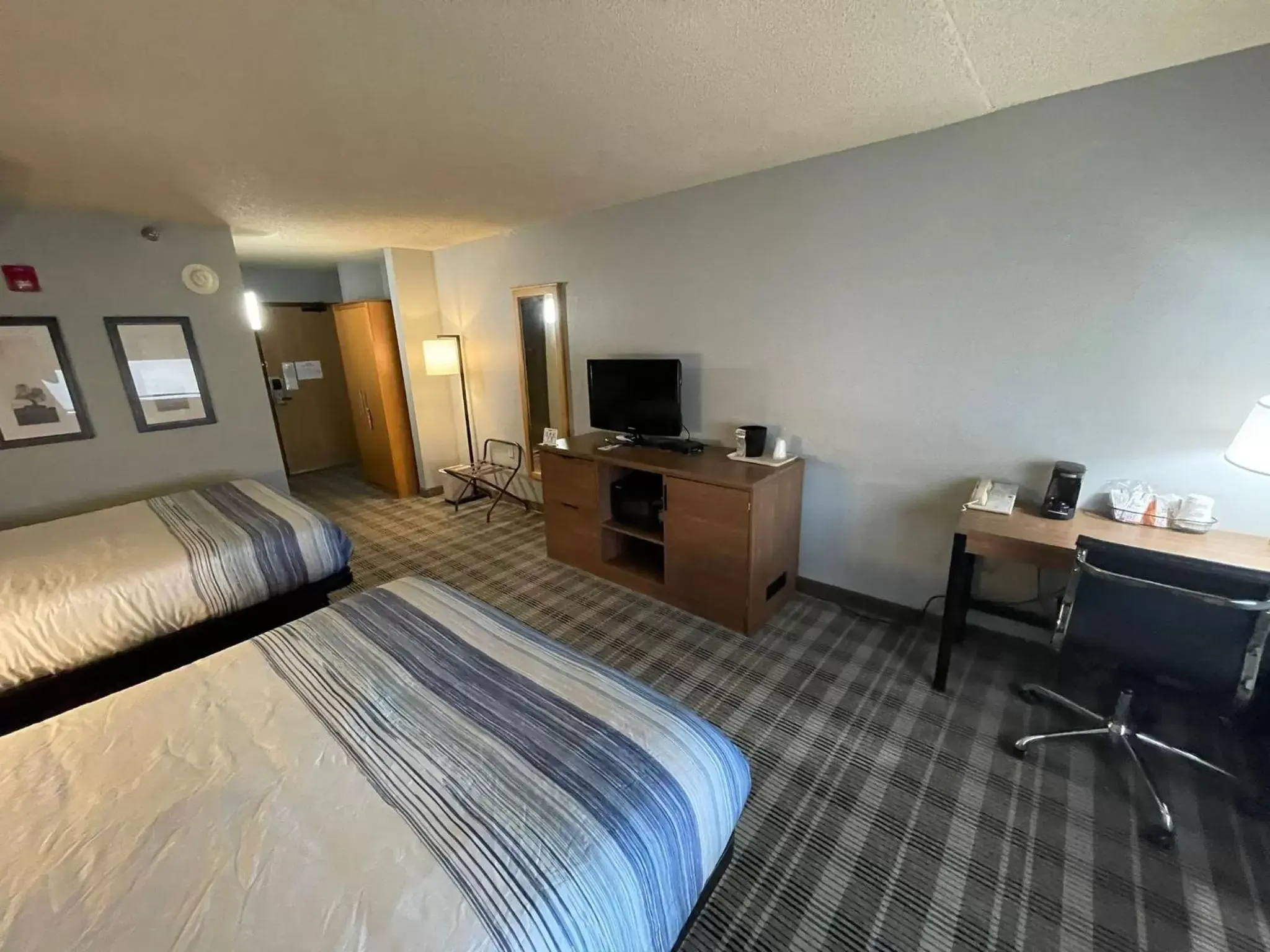 Photo of the whole room, TV/Entertainment Center in AmericInn by Wyndham Sayre