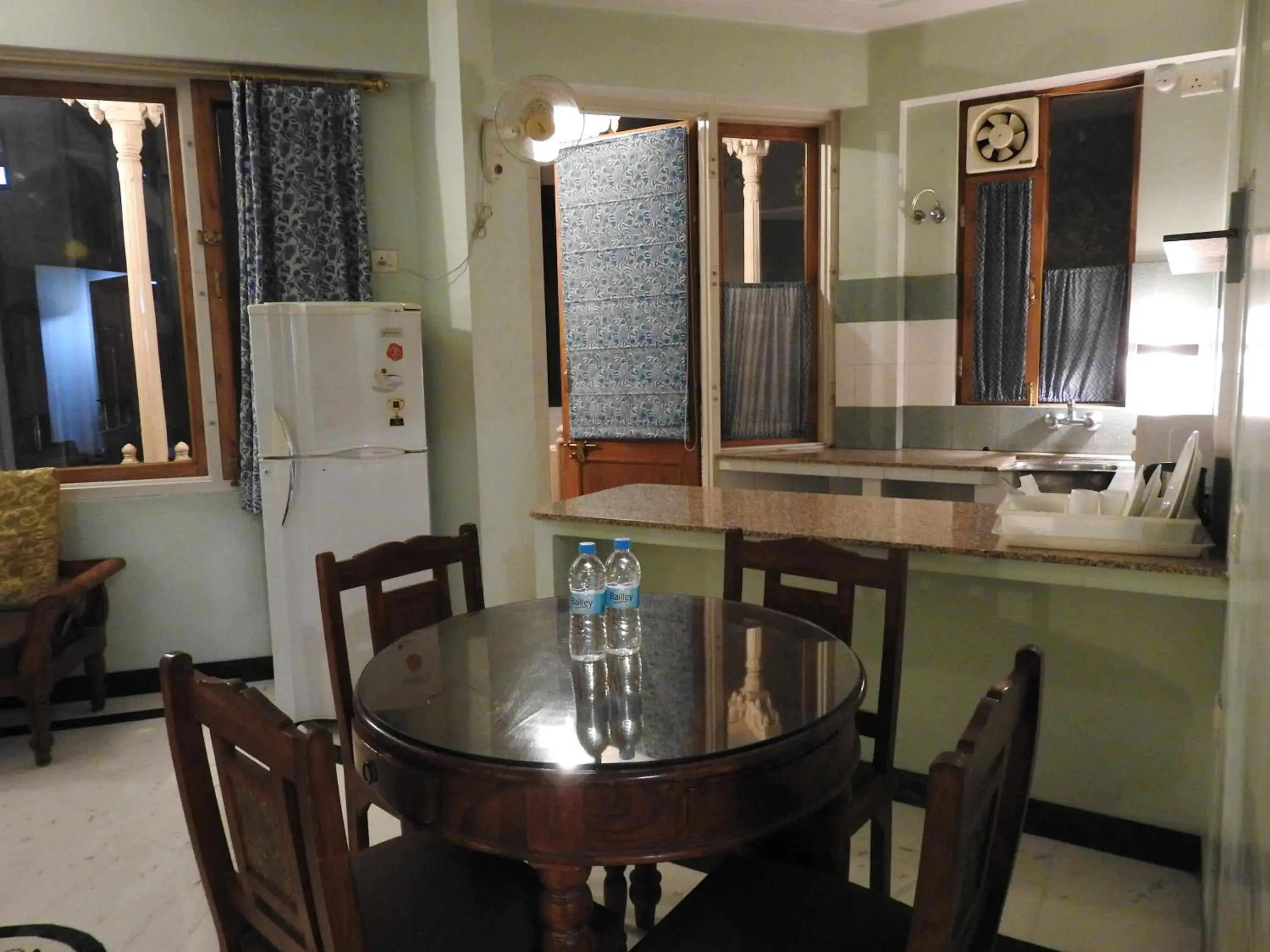 Coffee/tea facilities, Dining Area in Om Niwas Suite Hotel