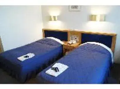 Bed in Hotel Siena Bed in Hotel Siena