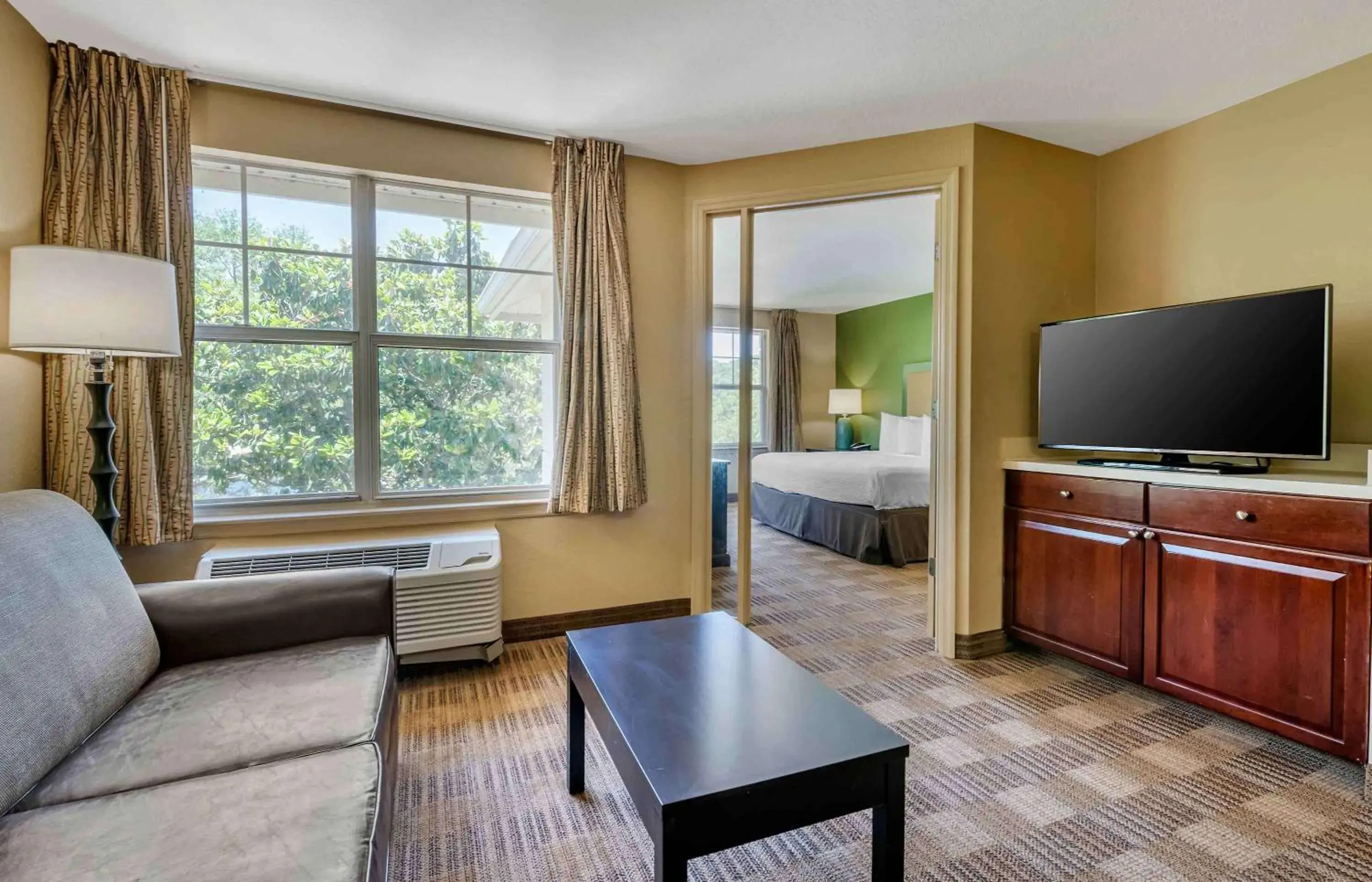 Bedroom, TV/Entertainment Center in Extended Stay America Suites - Raleigh - RTP - 4919 Miami Blvd