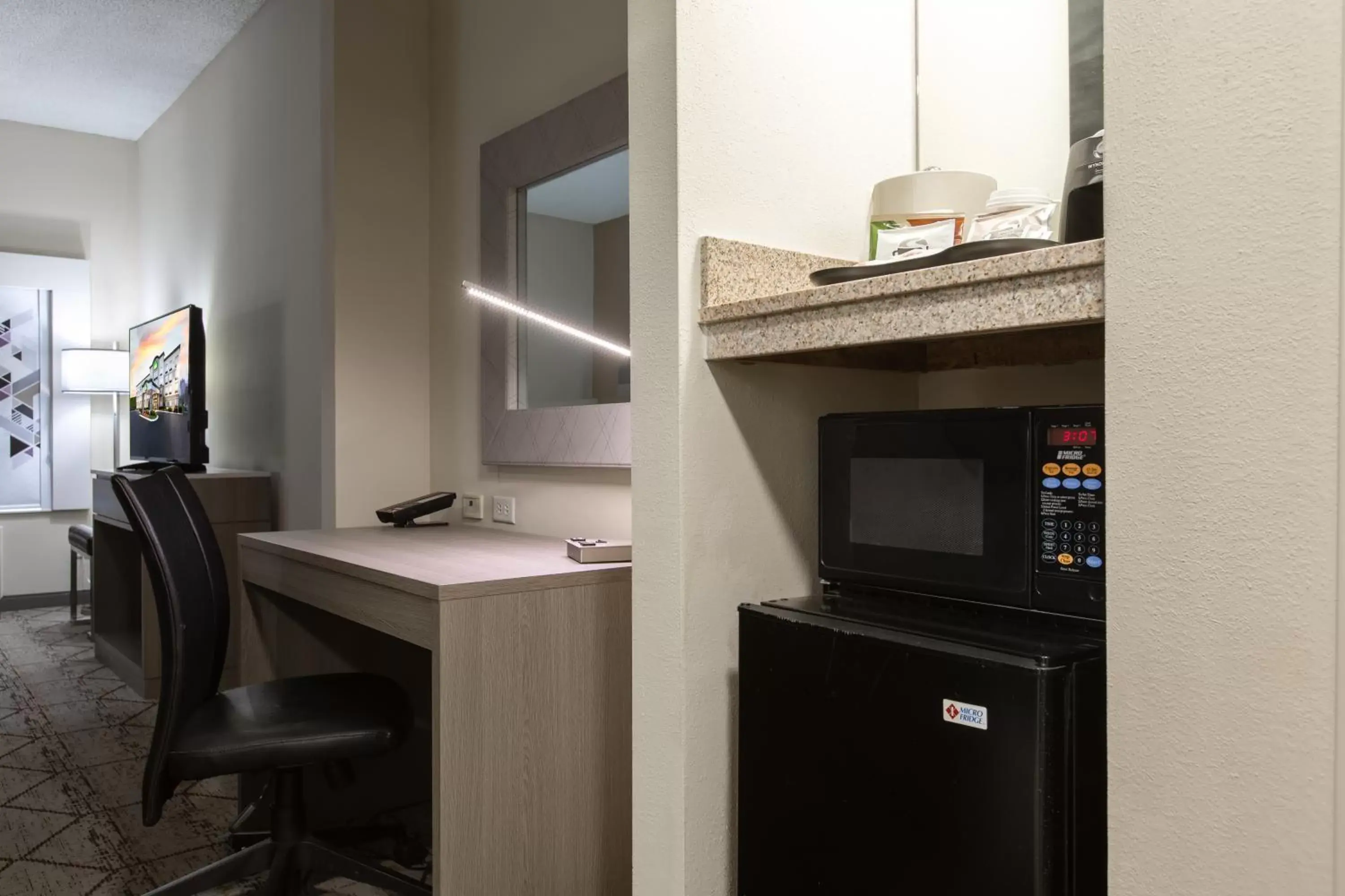 TV and multimedia, Kitchen/Kitchenette in Wingate by Wyndham Charlotte Concord Mills/Speedway