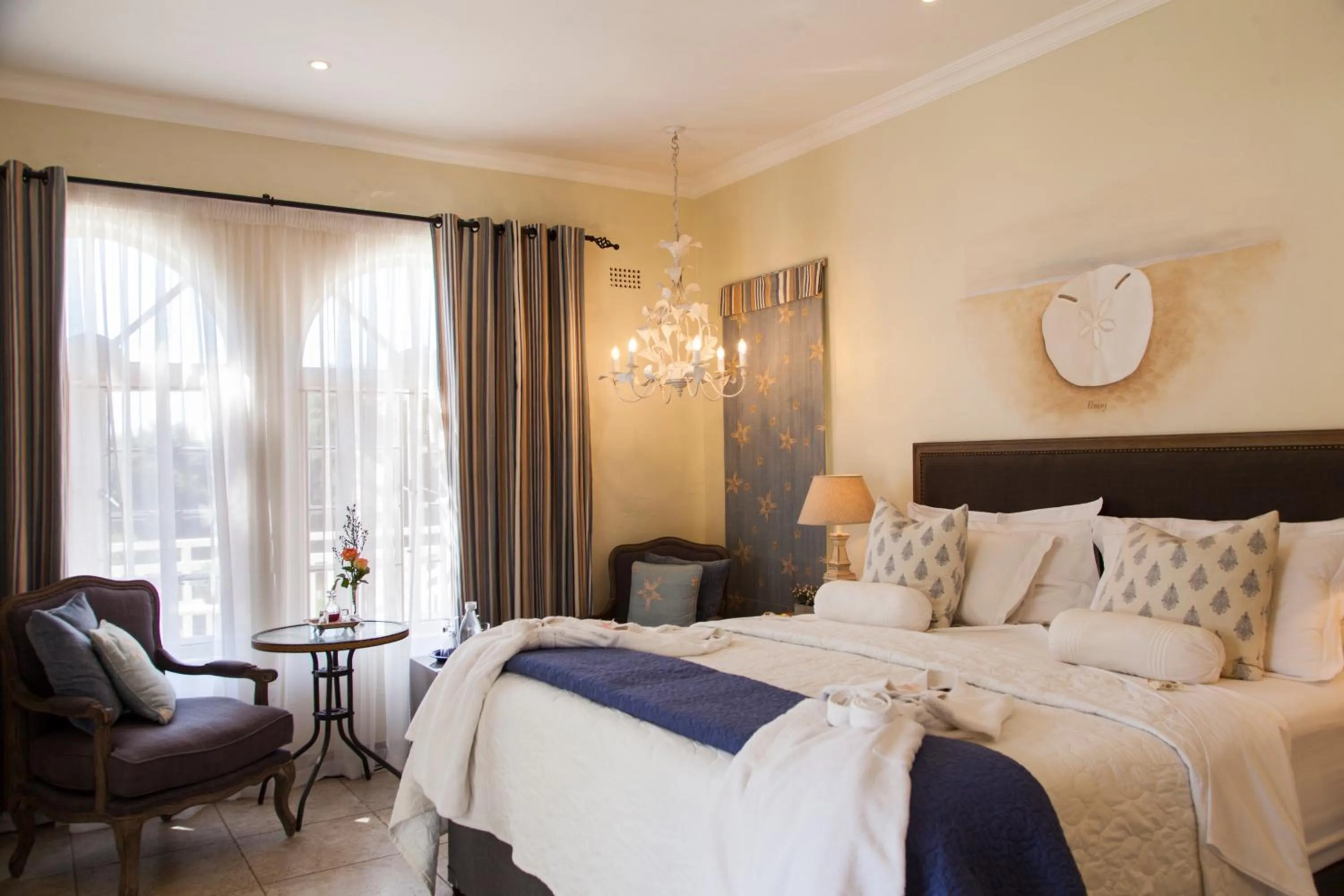 Bed in Sandals Guest House