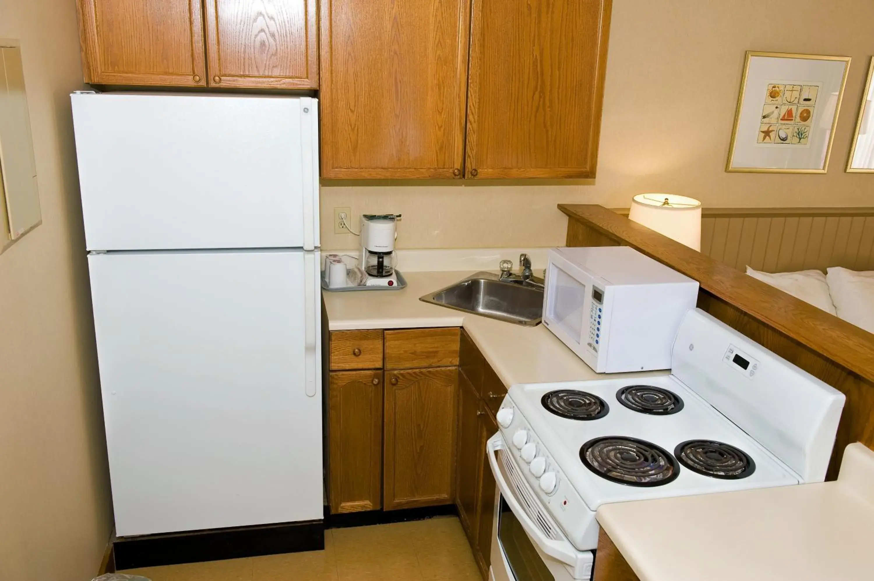 Kitchen or kitchenette, Kitchen/Kitchenette in Charlottetown Inn & Conference Centre