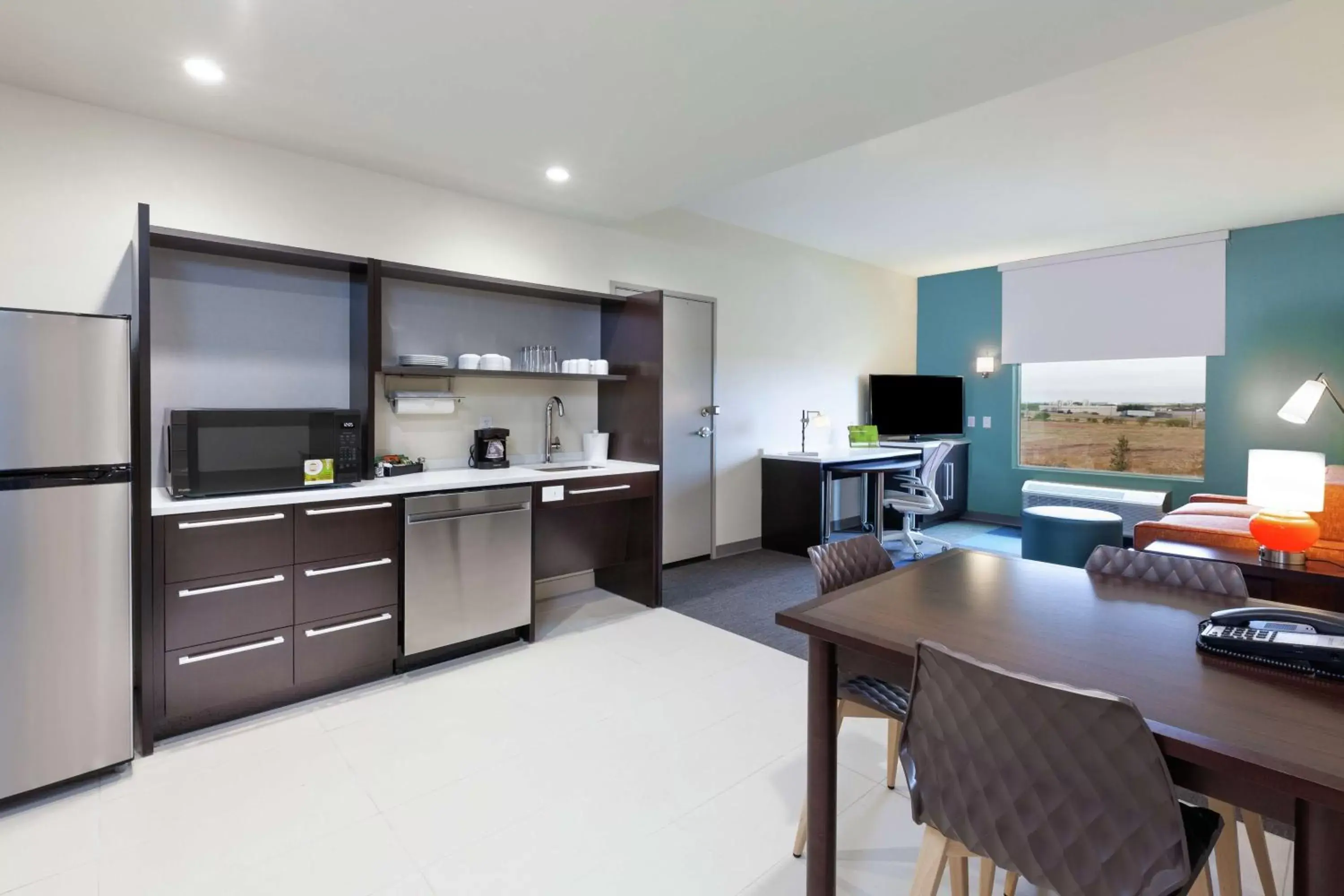 Bedroom, Kitchen/Kitchenette in Home2 Suites By Hilton Abilene, TX
