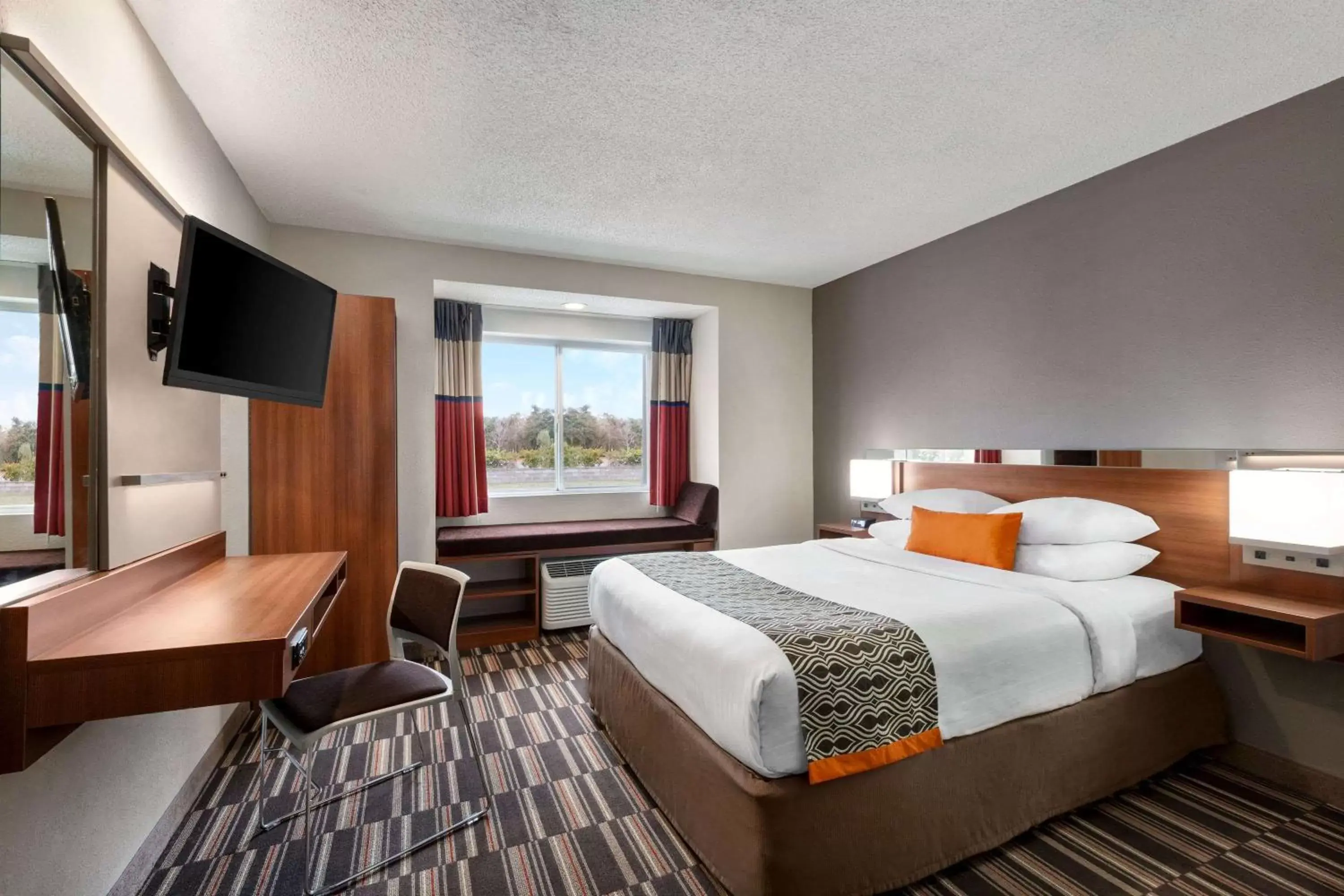 Photo of the whole room, Bed in Microtel Inn & Suites by Wyndham