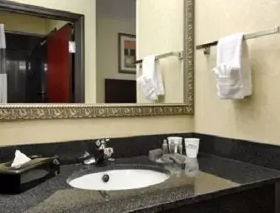 Bathroom in Baymont by Wyndham Henderson Bathroom in Baymont by Wyndham Henderson