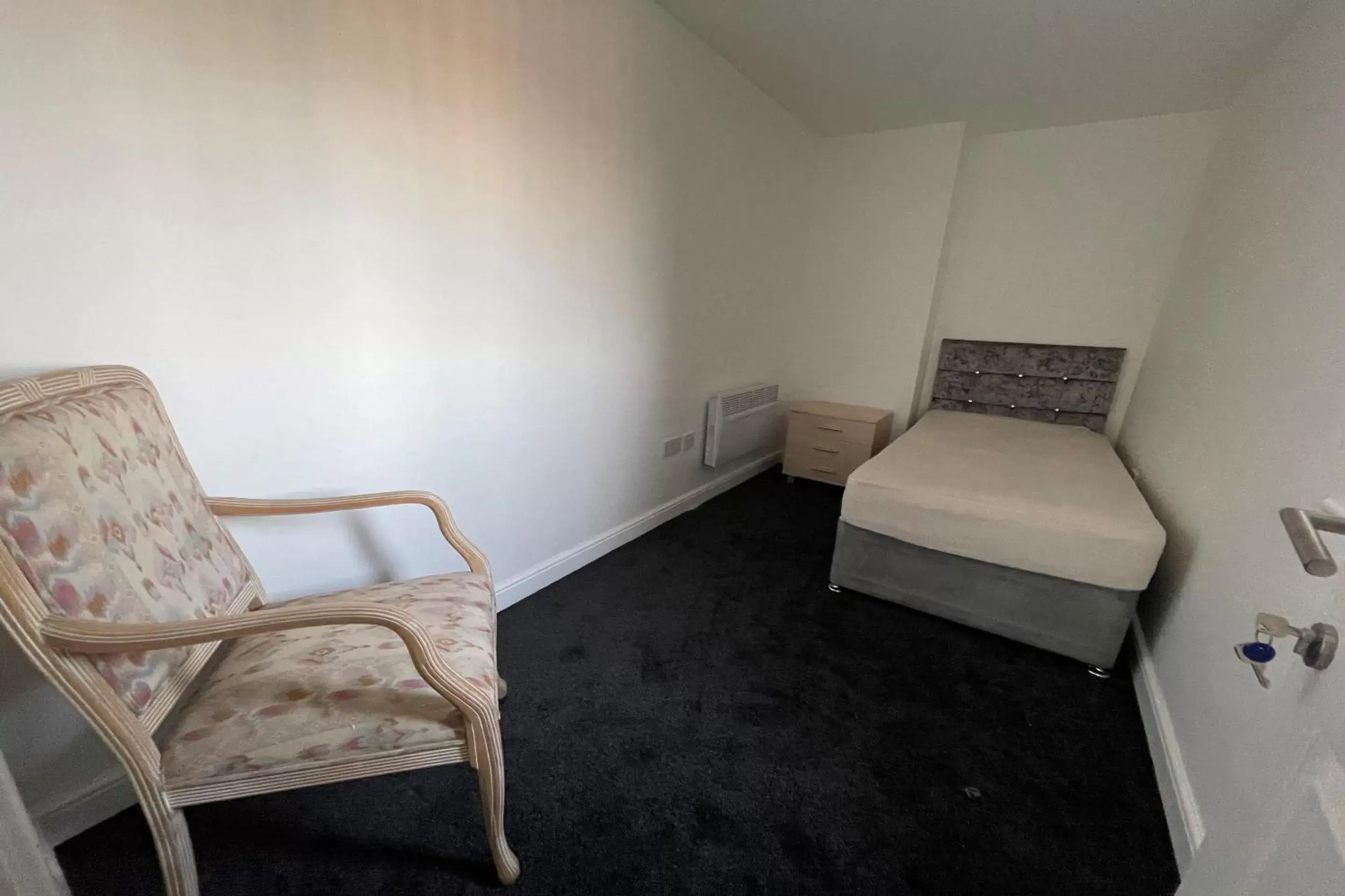 Bedroom, Seating Area in OYO Victoria Apartments