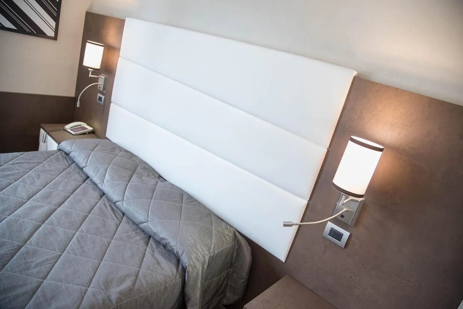 Bed in Reginna Palace Hotel