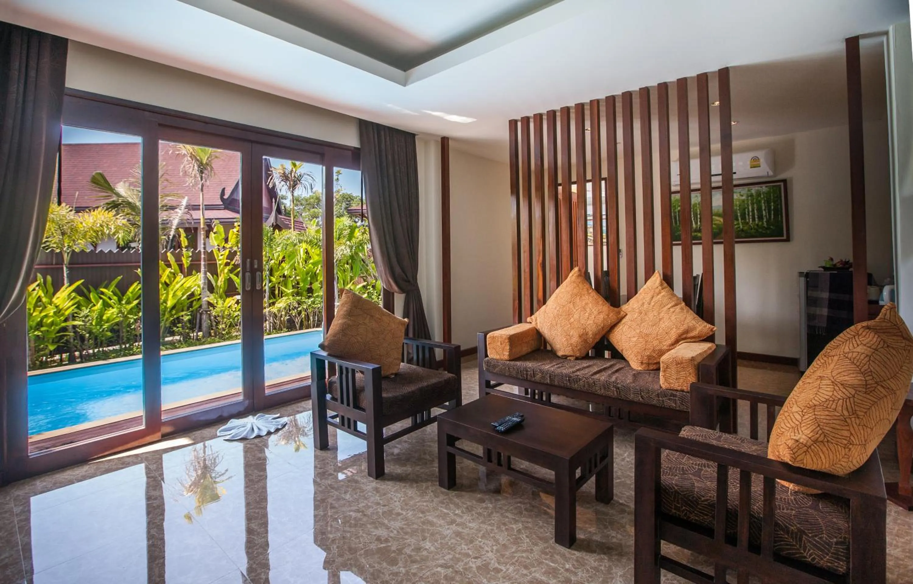 Living room, Pool View in T-Villa Phuket