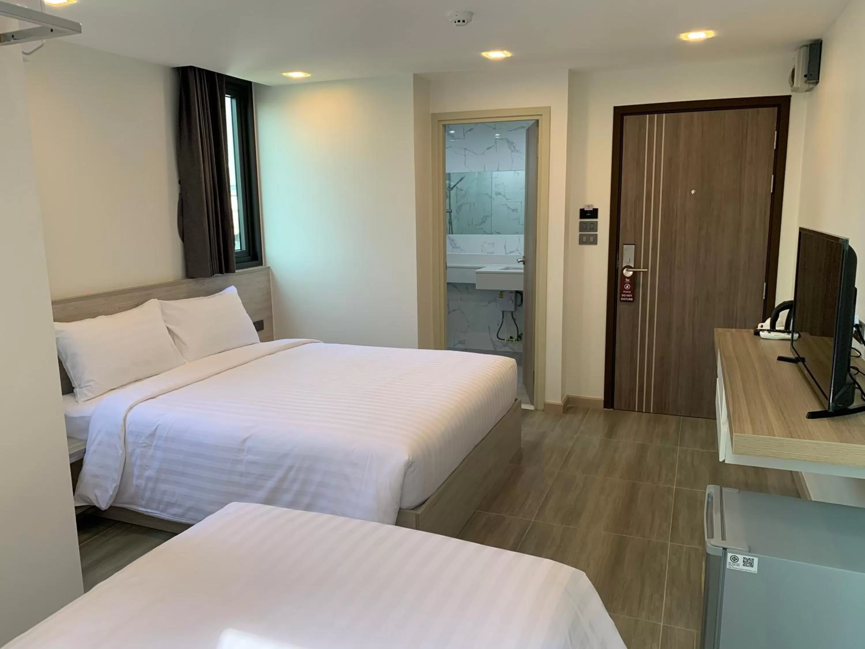 Bed in Thana Wisut Hotel