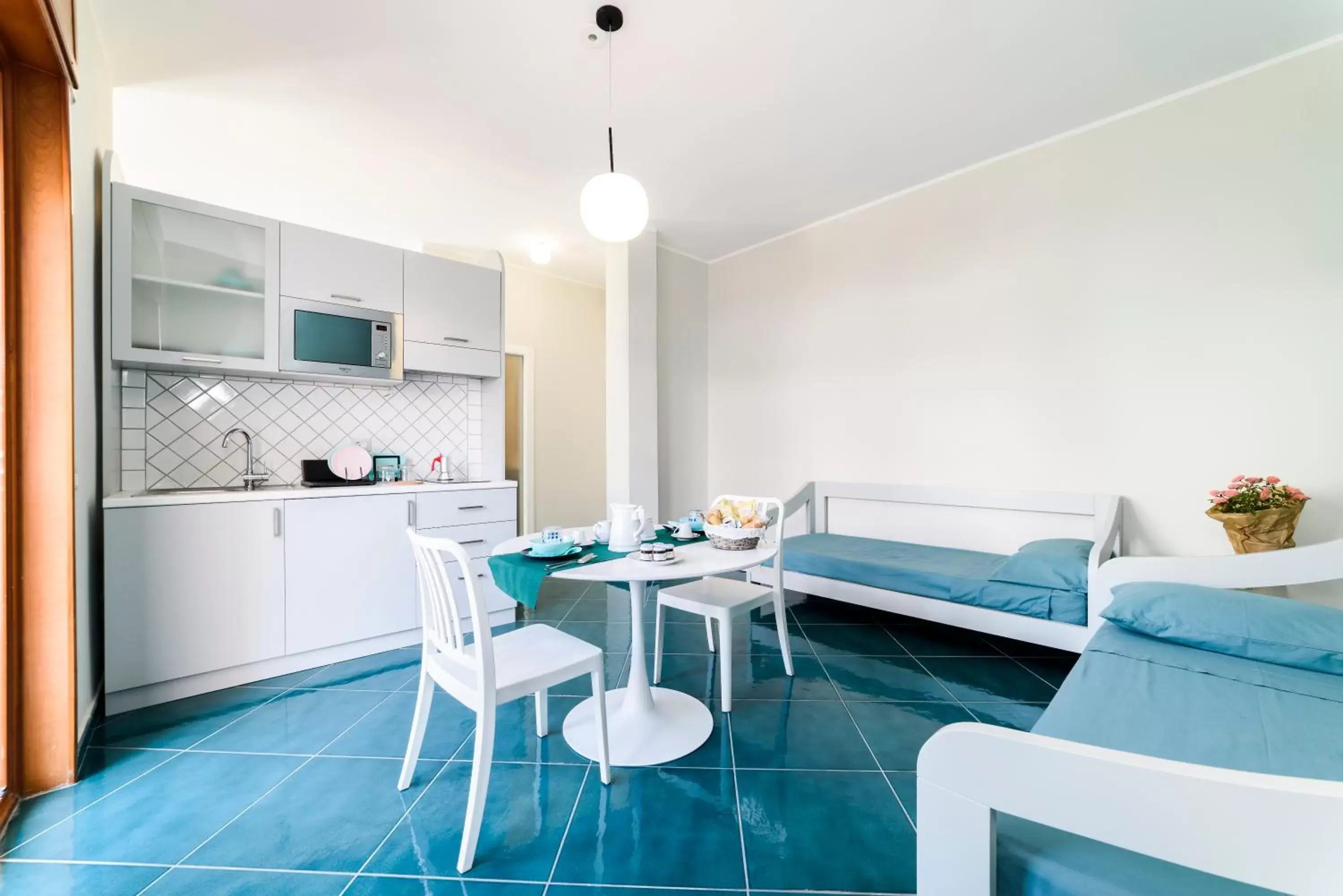 Living room, Kitchen/Kitchenette in Il Papavero Residence Arbostella