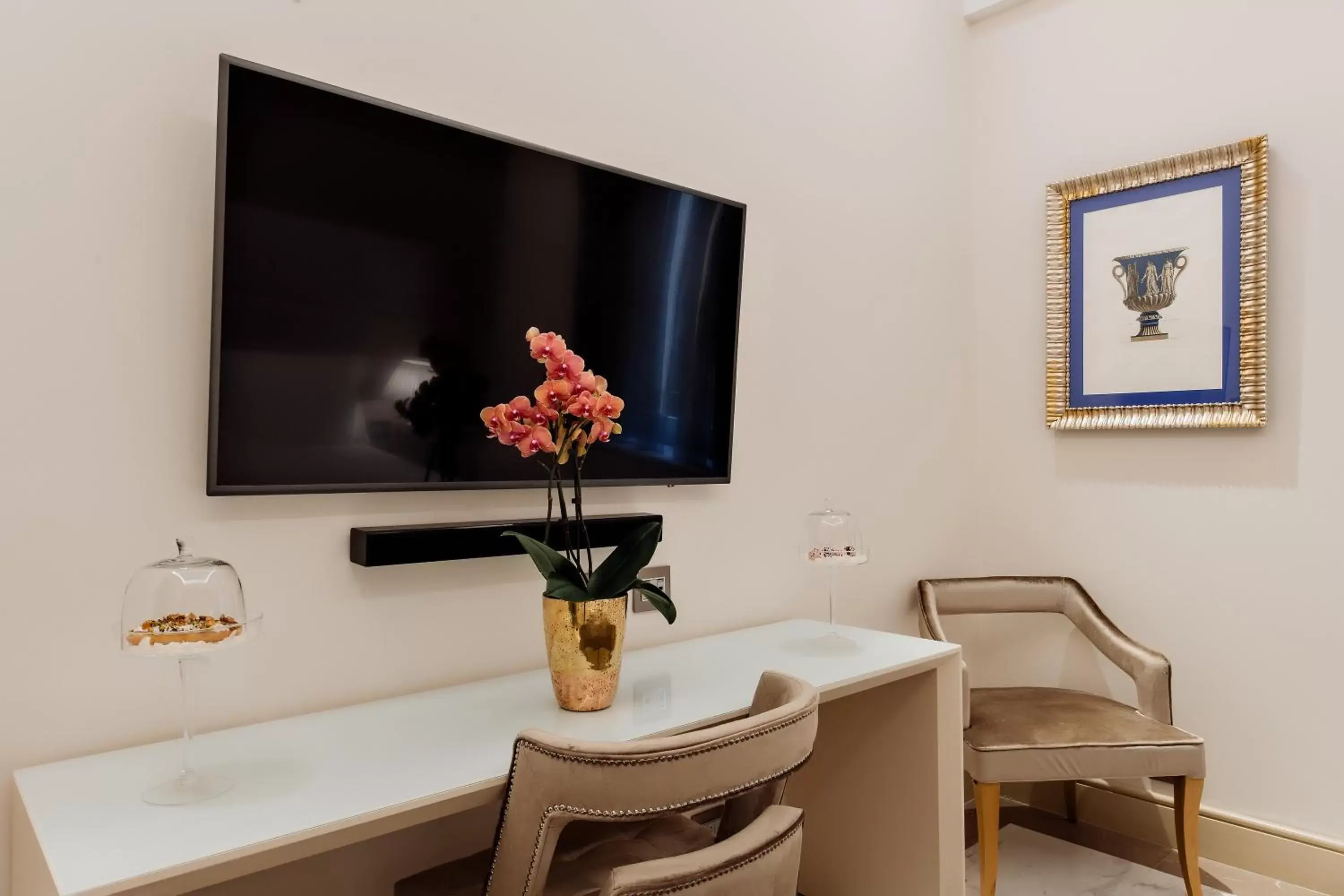 TV/Entertainment Center in Aleph Rome Hotel, Curio Collection By Hilton