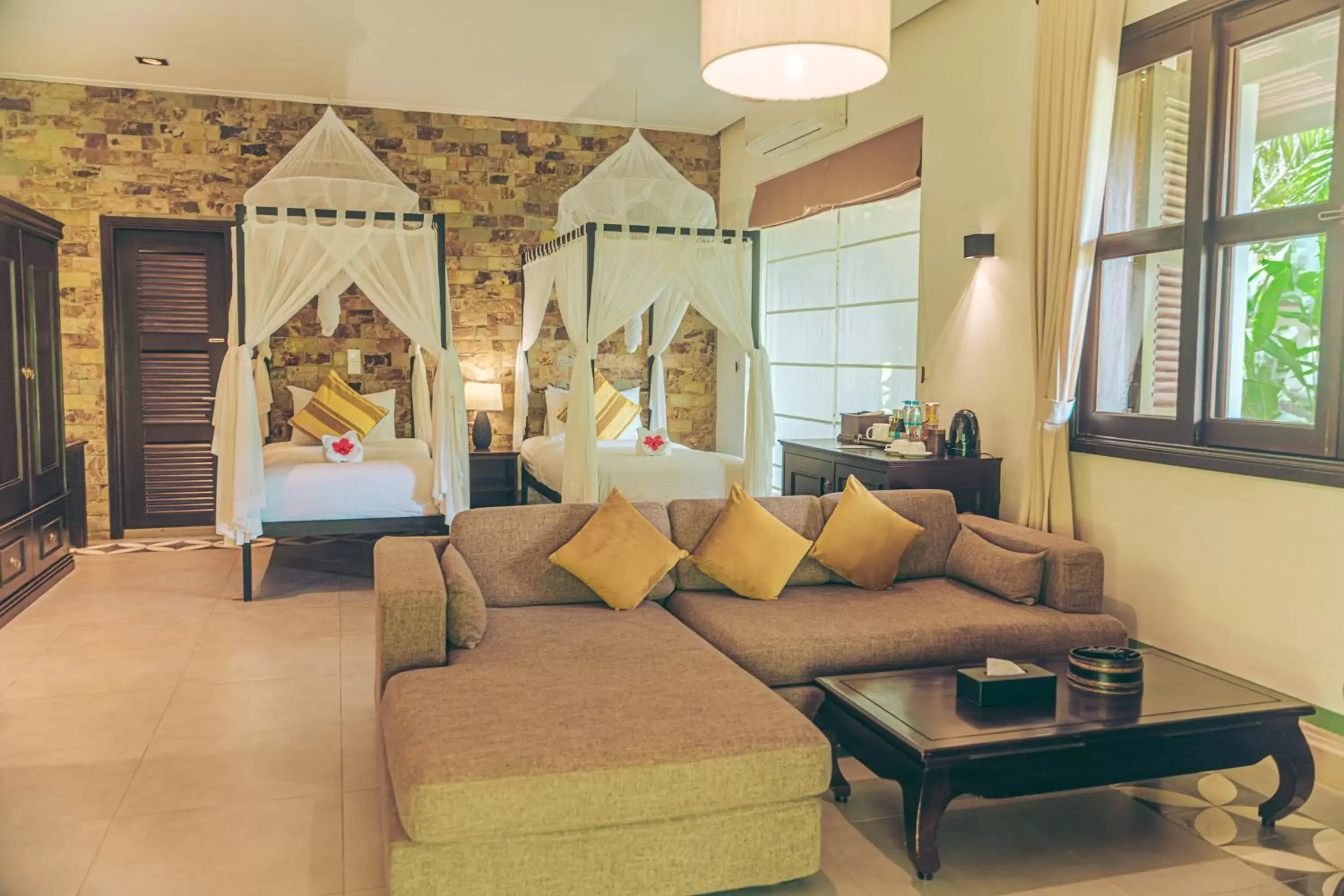 Bedroom, Seating Area in Samanea Beach Resort & Spa