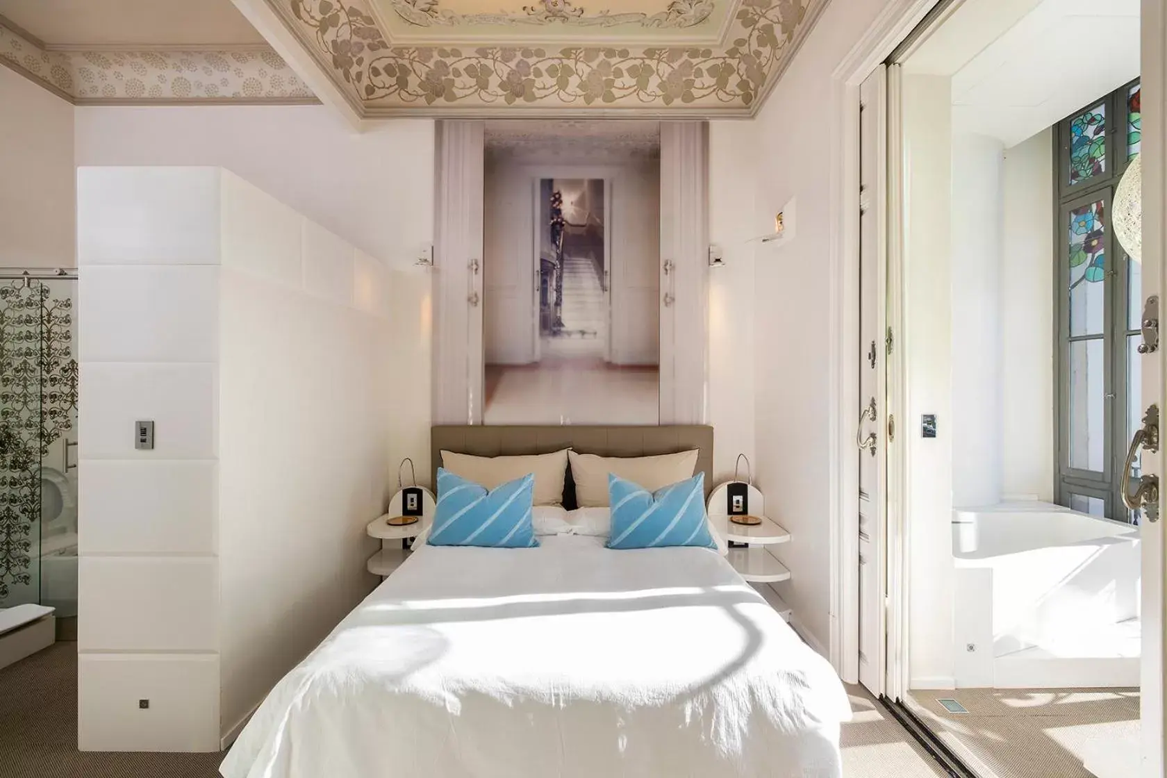 Bed in El Palauet Royal Suites