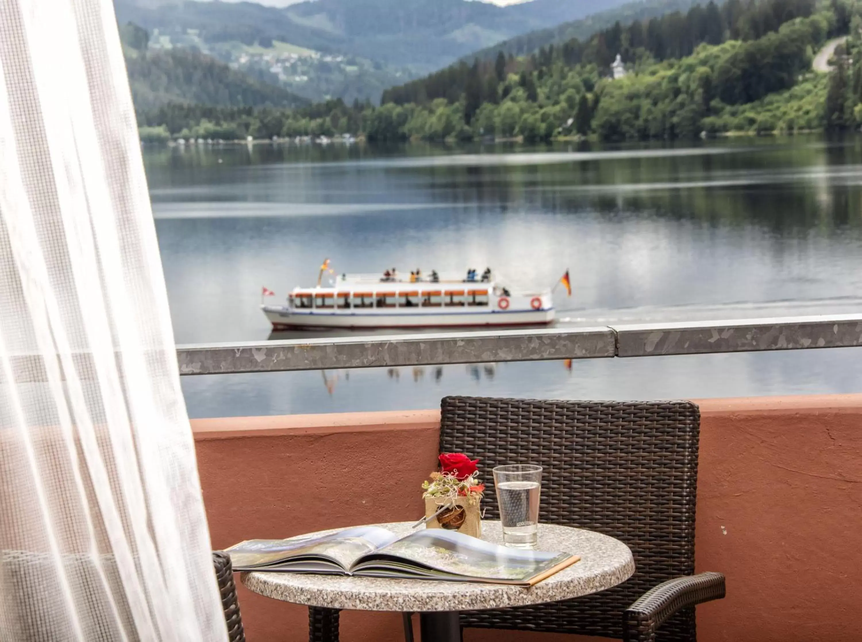 Bedroom, River View in Maritim Titisee Hotel