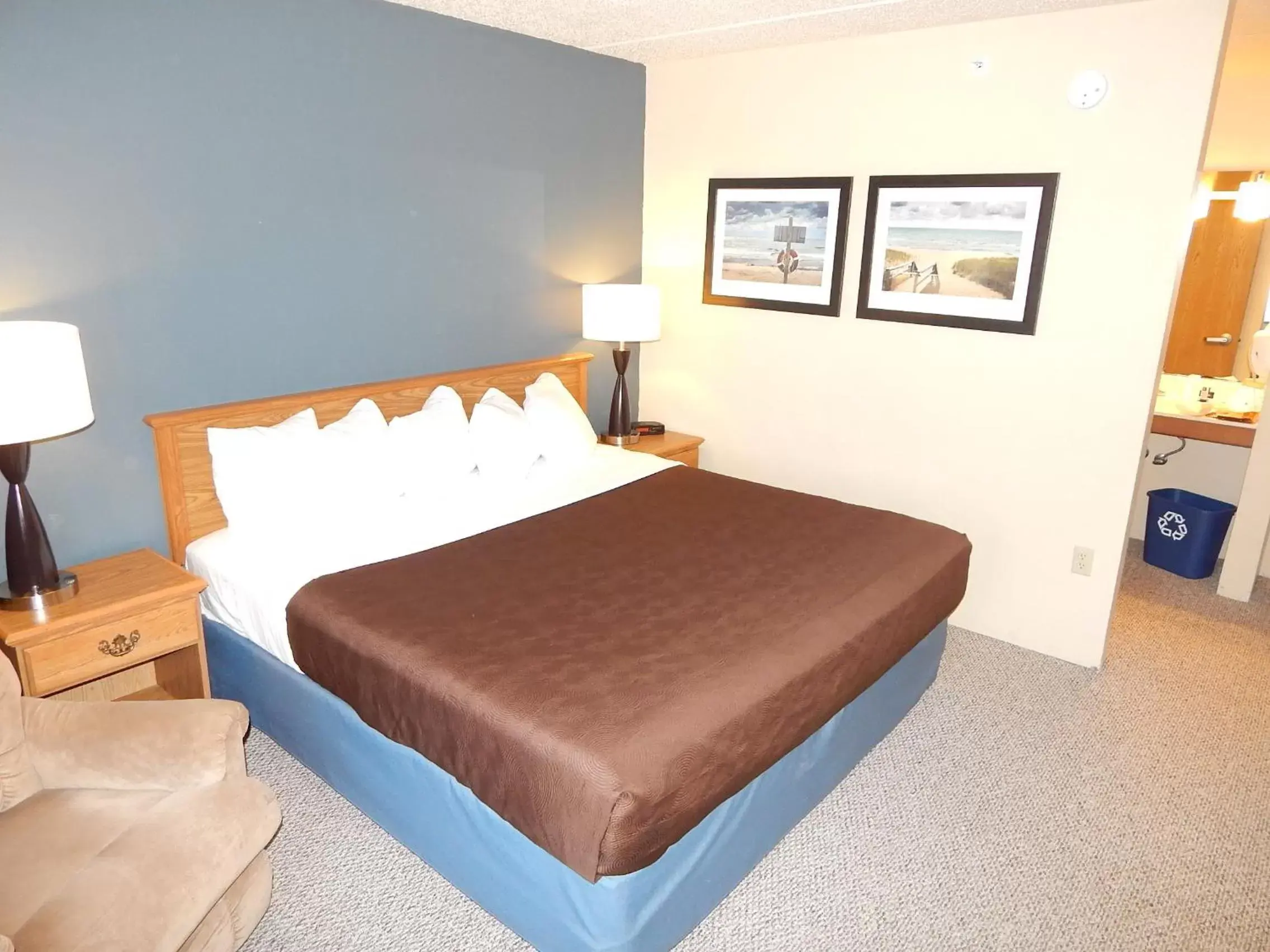 Bed in AmericInn by Wyndham Sturgeon Bay