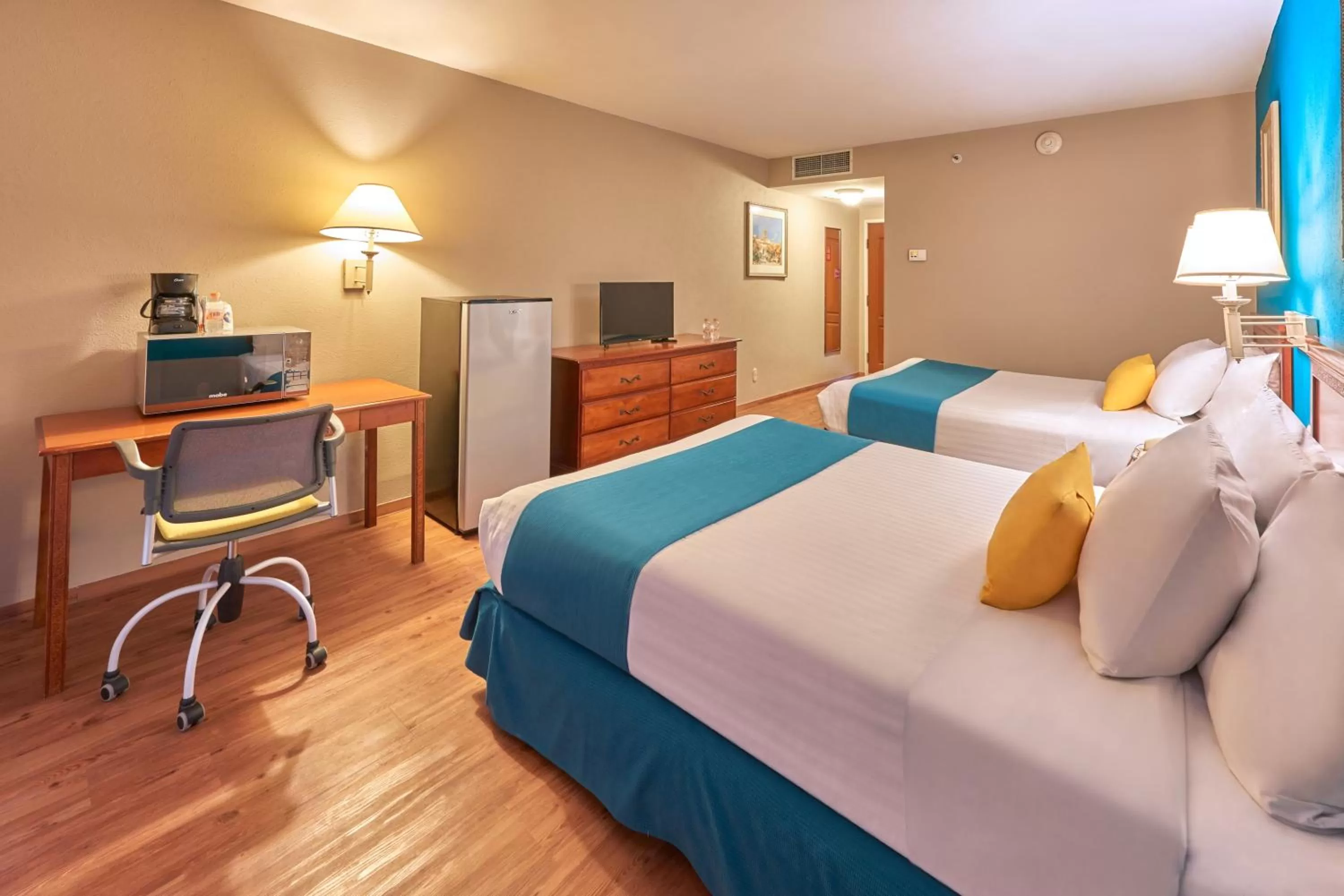 Photo of the whole room, Bed in Sierra Suites By HP Hotels