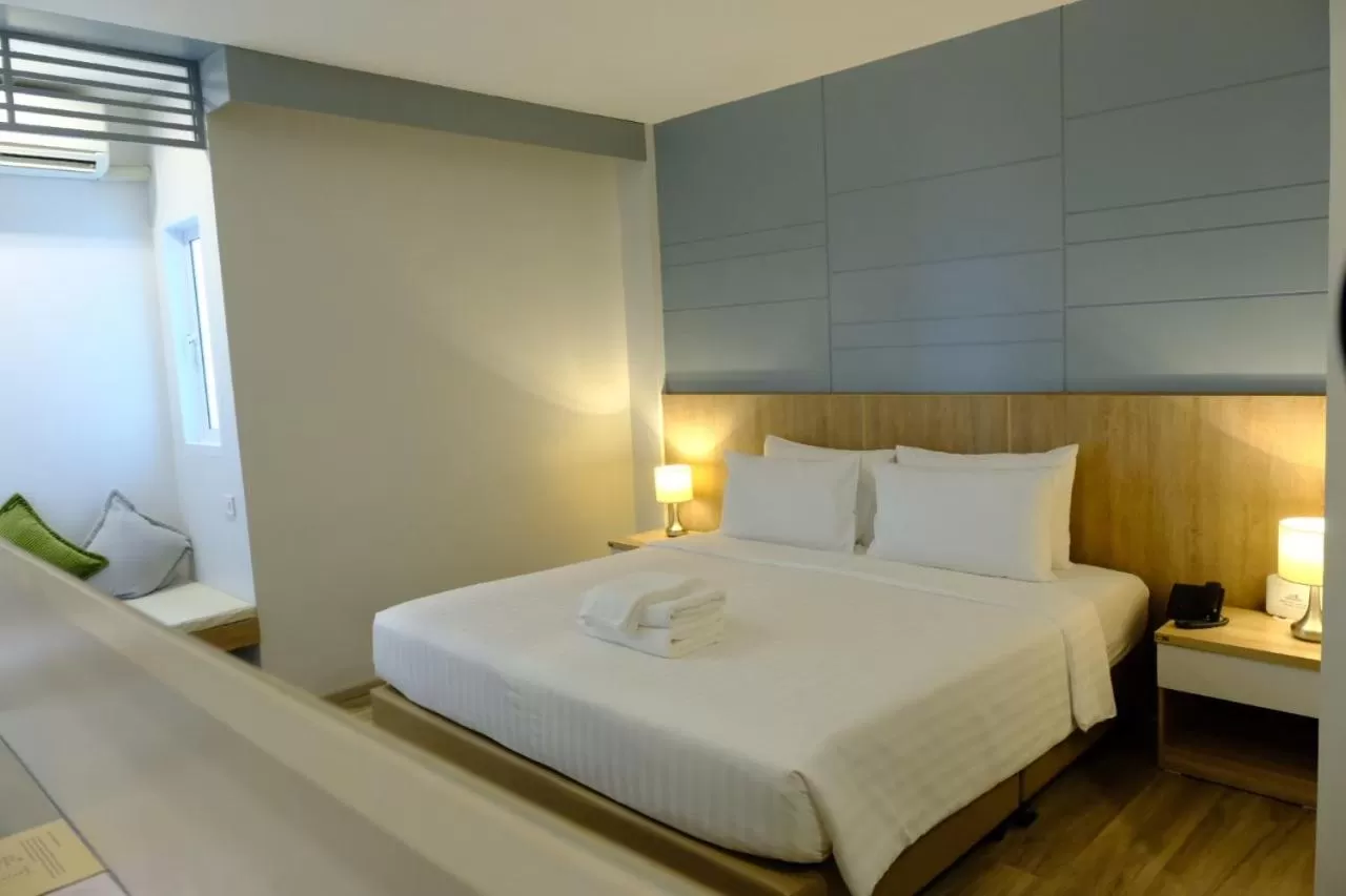 Bed in P21 Chiangmai Hotel