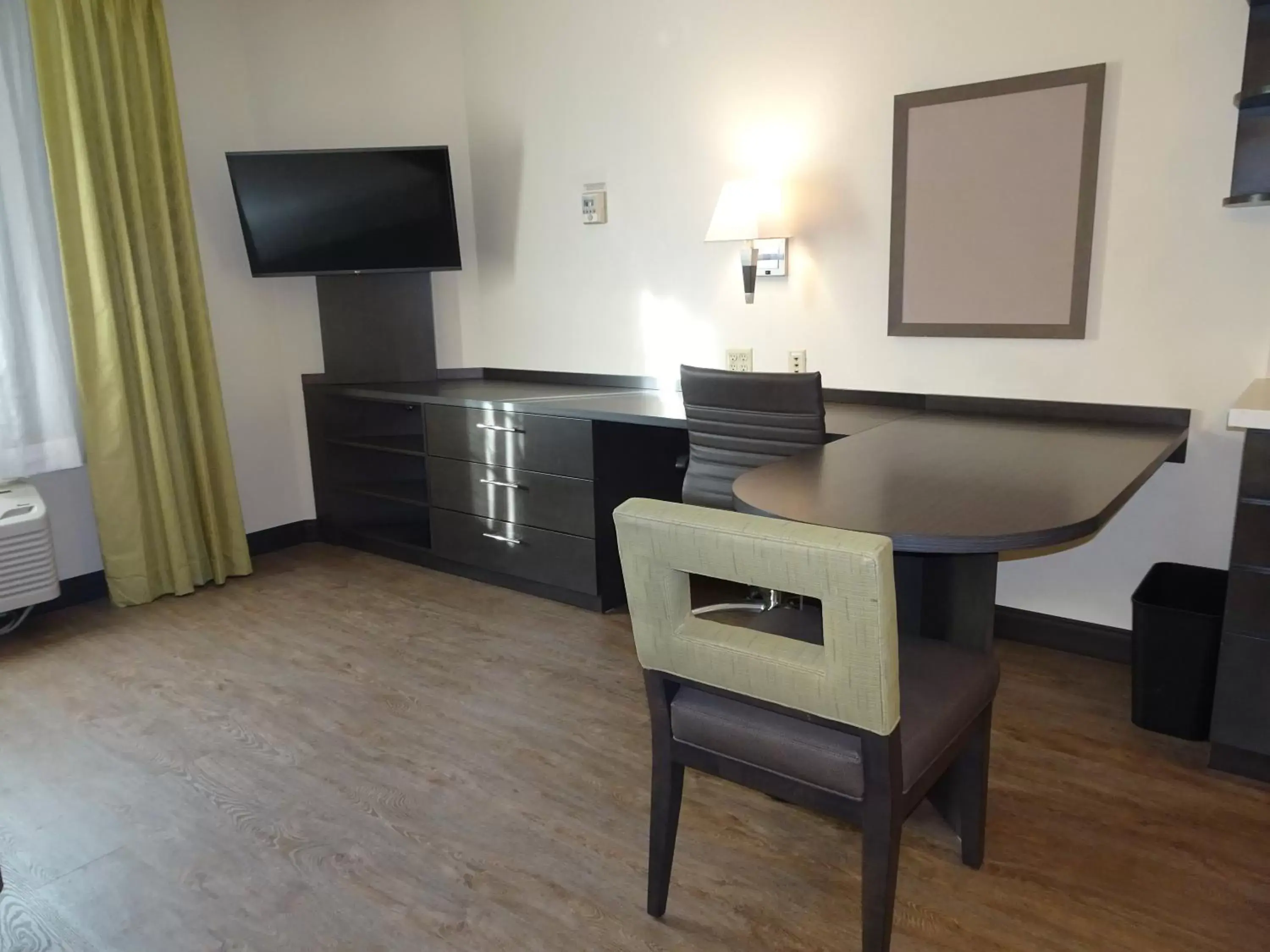 Photo of the whole room, TV/Entertainment Center in Candlewood Suites Richmond West End Short Pump, an IHG Hotel