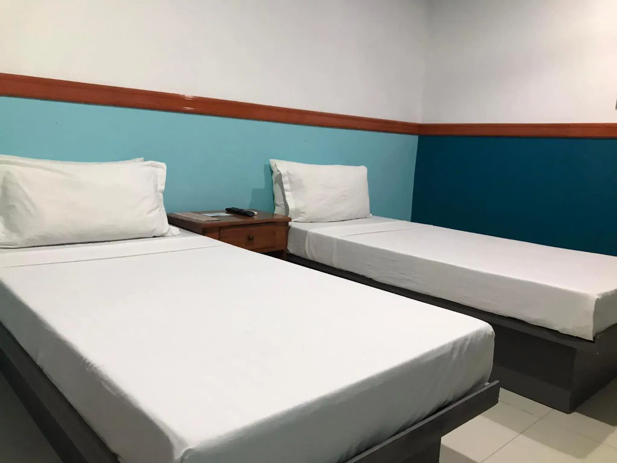 Bed in Garnet Hotel
