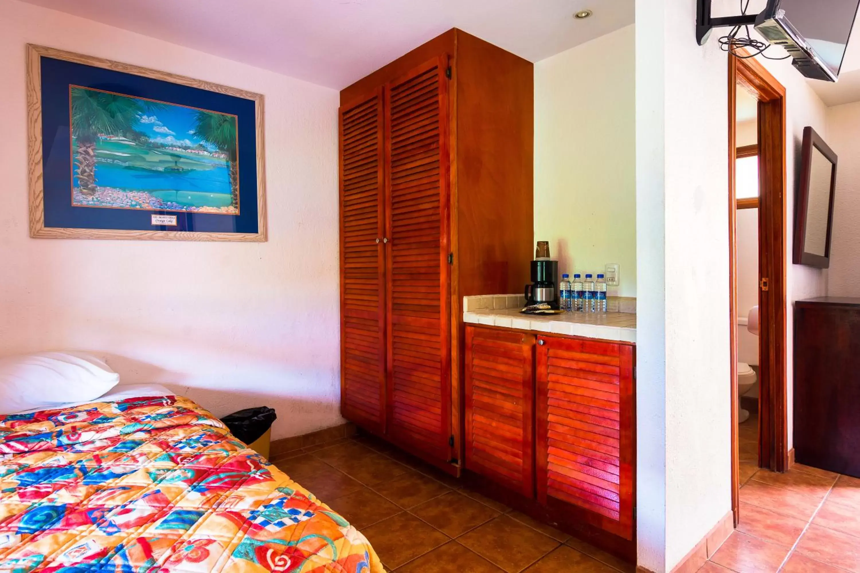 Photo of the whole room, TV/Entertainment Center in Costa Rica Surf Camp by SUPERbrand