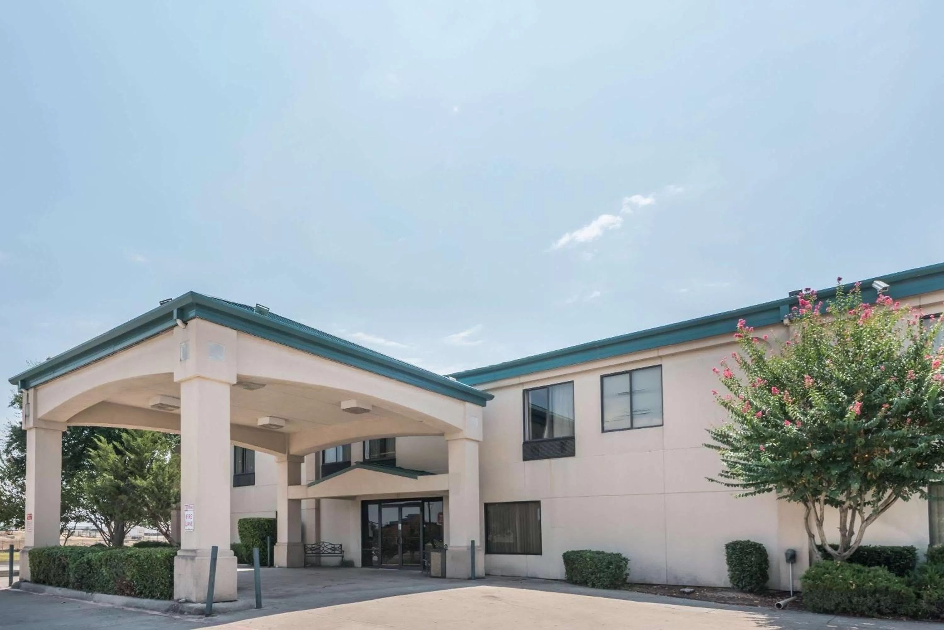 Property building in Super 8 by Wyndham Fort Worth Downtown South