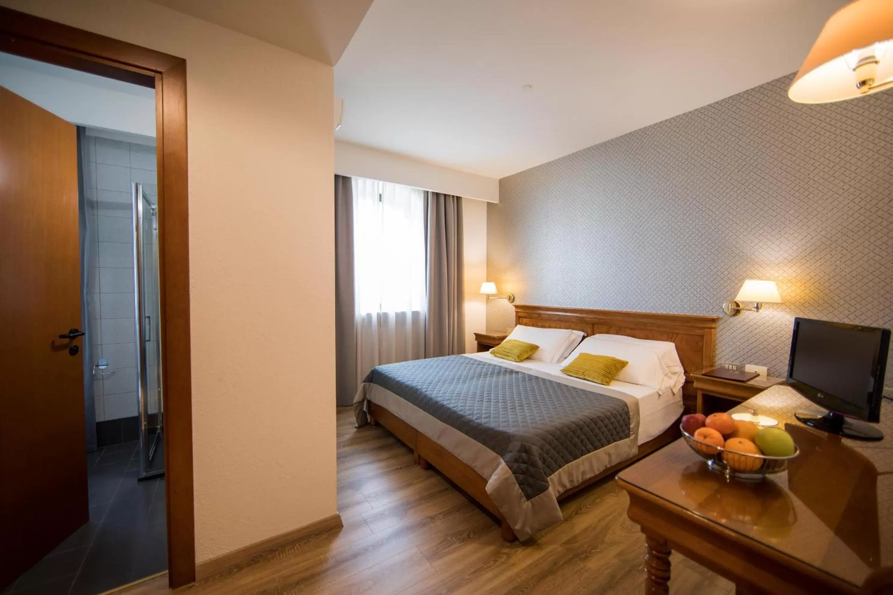 Photo of the whole room, Bed in Hotel Diana Jardin et Spa Photo of the whole room, Bed in Hotel Diana Jardin et Spa