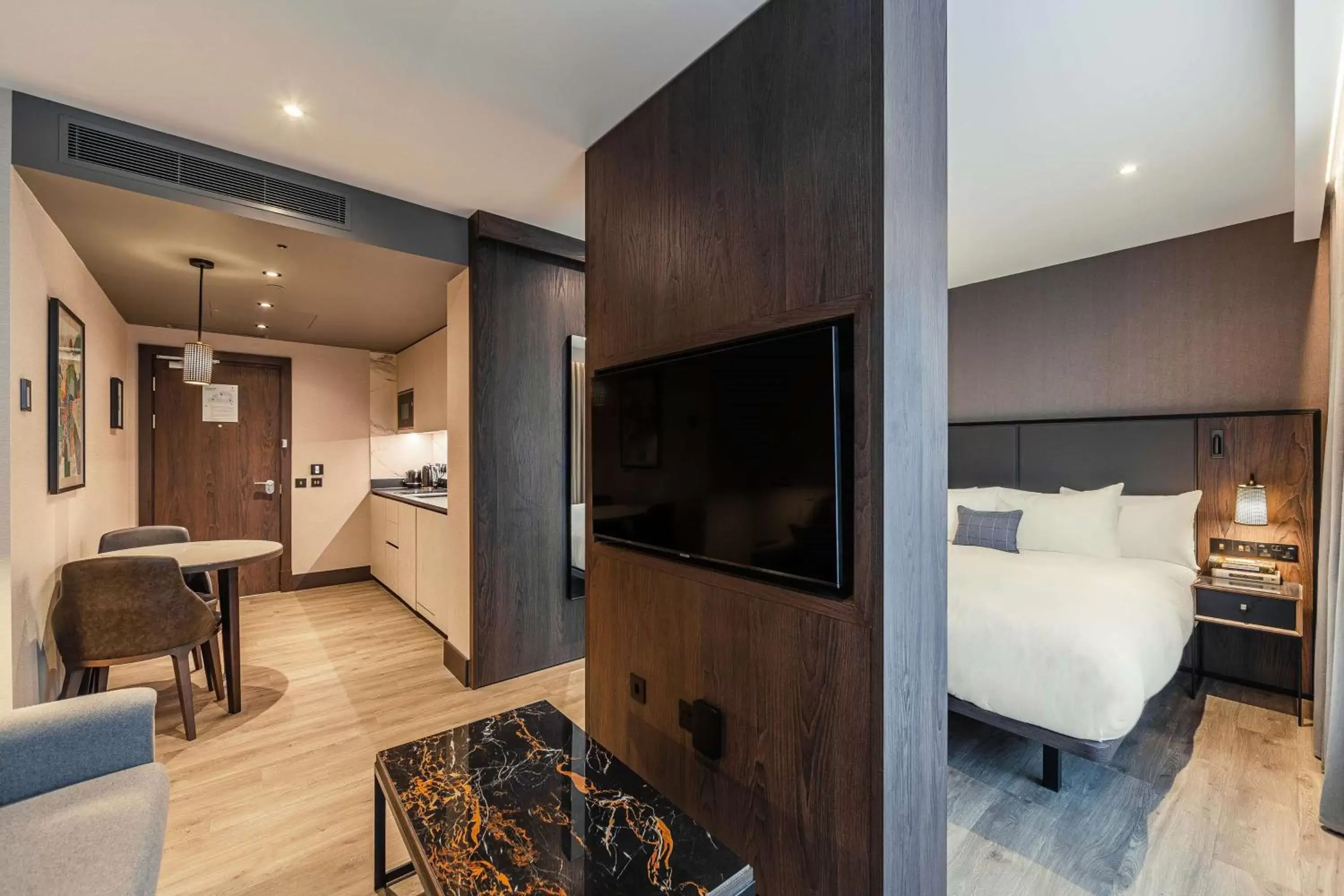 Bedroom, TV/Entertainment Center in The Fellows House Cambridge, Curio Collection By Hilton