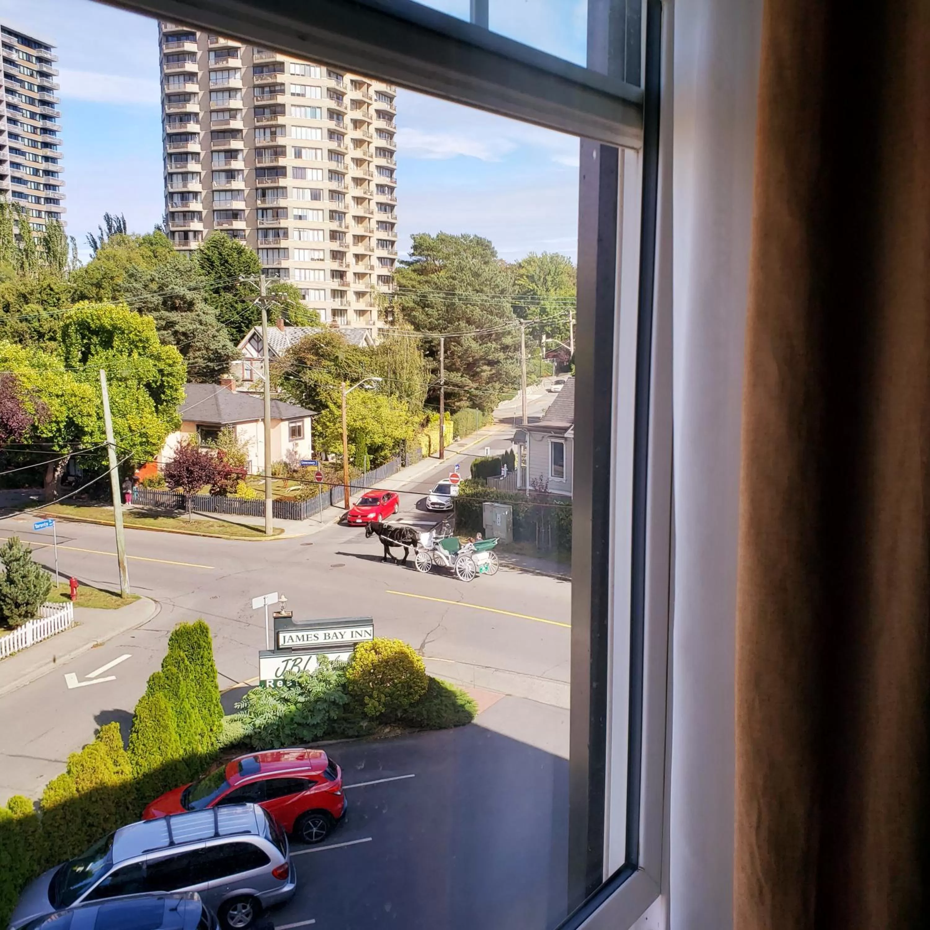 Property logo or sign in James Bay Inn Hotel, Suites & Cottage