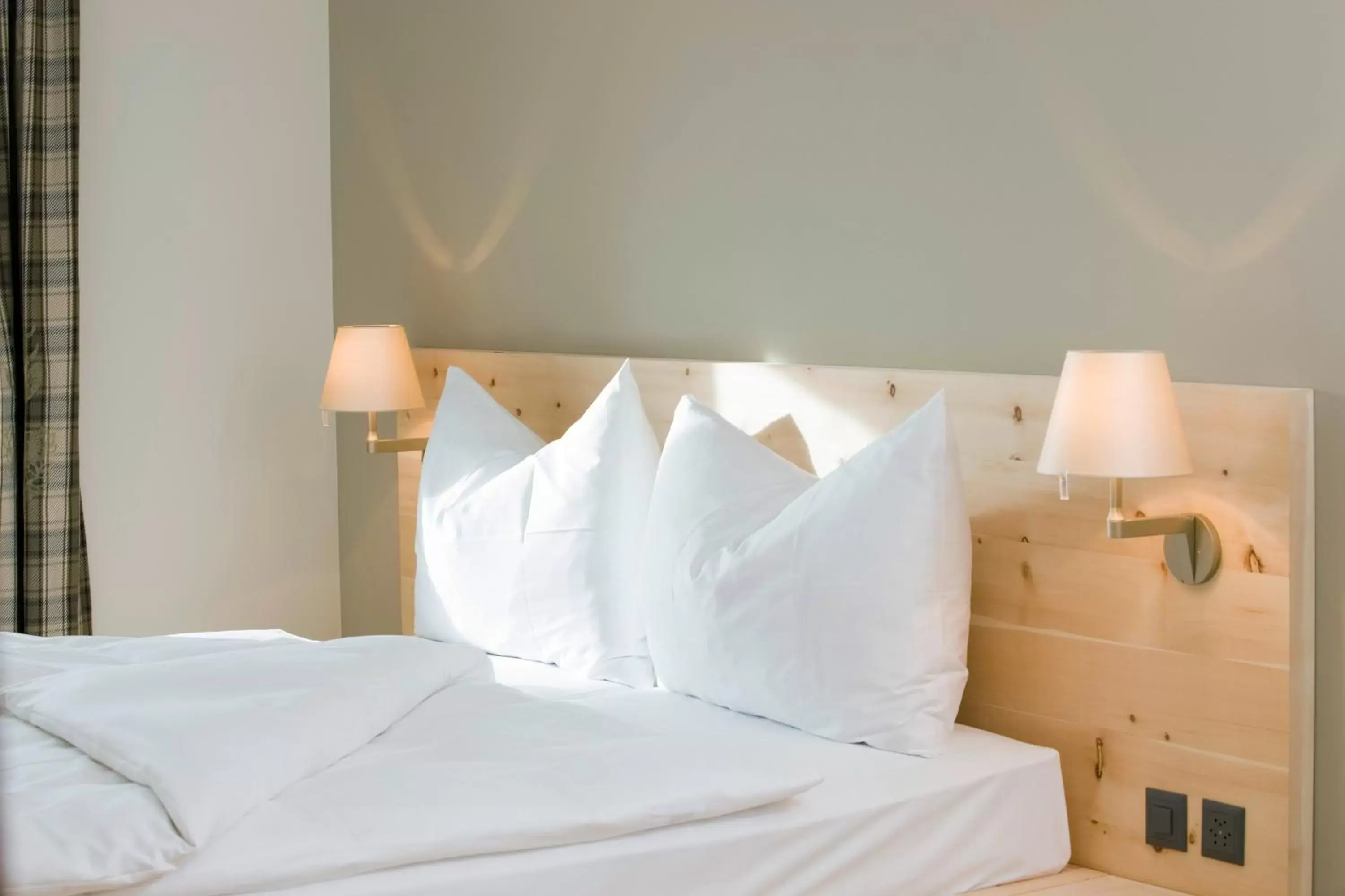 Bed in Romantik Hotel Muottas Muragl