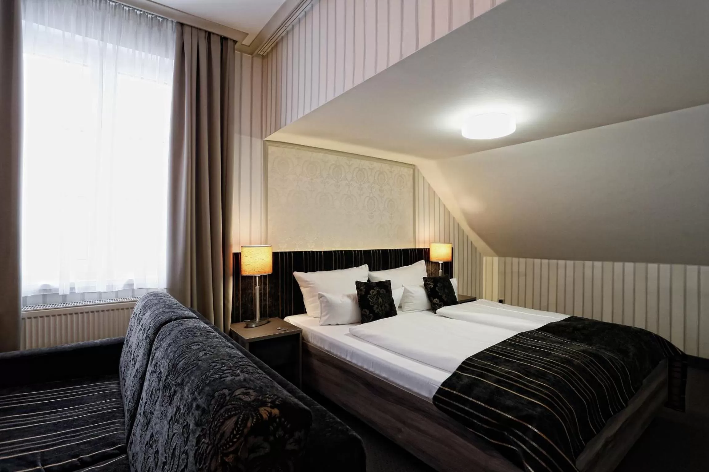 Photo of the whole room, Bed in Konsumhotel Dorotheenhof Weimar