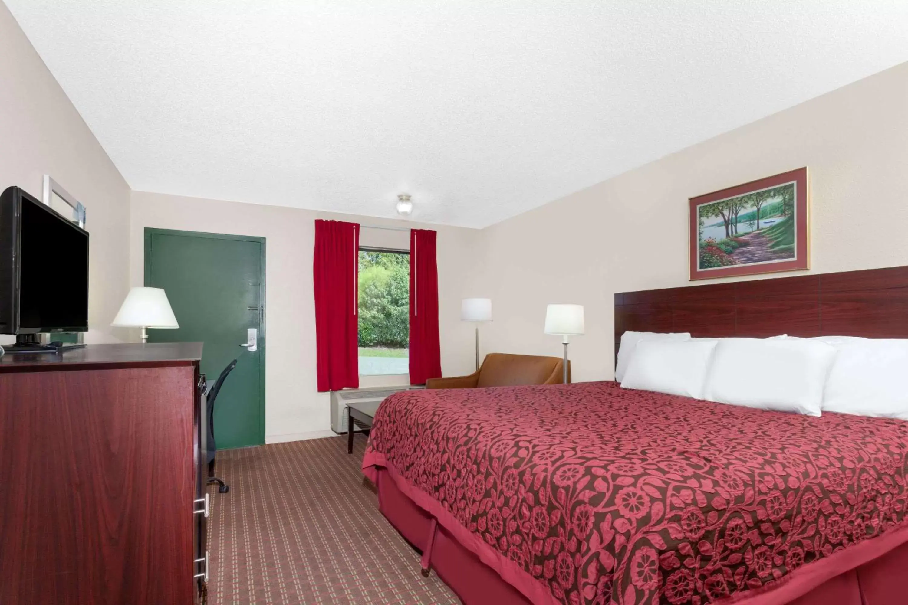 Photo of the whole room, Bed in Days Inn by Wyndham Columbia NE Fort Jackson