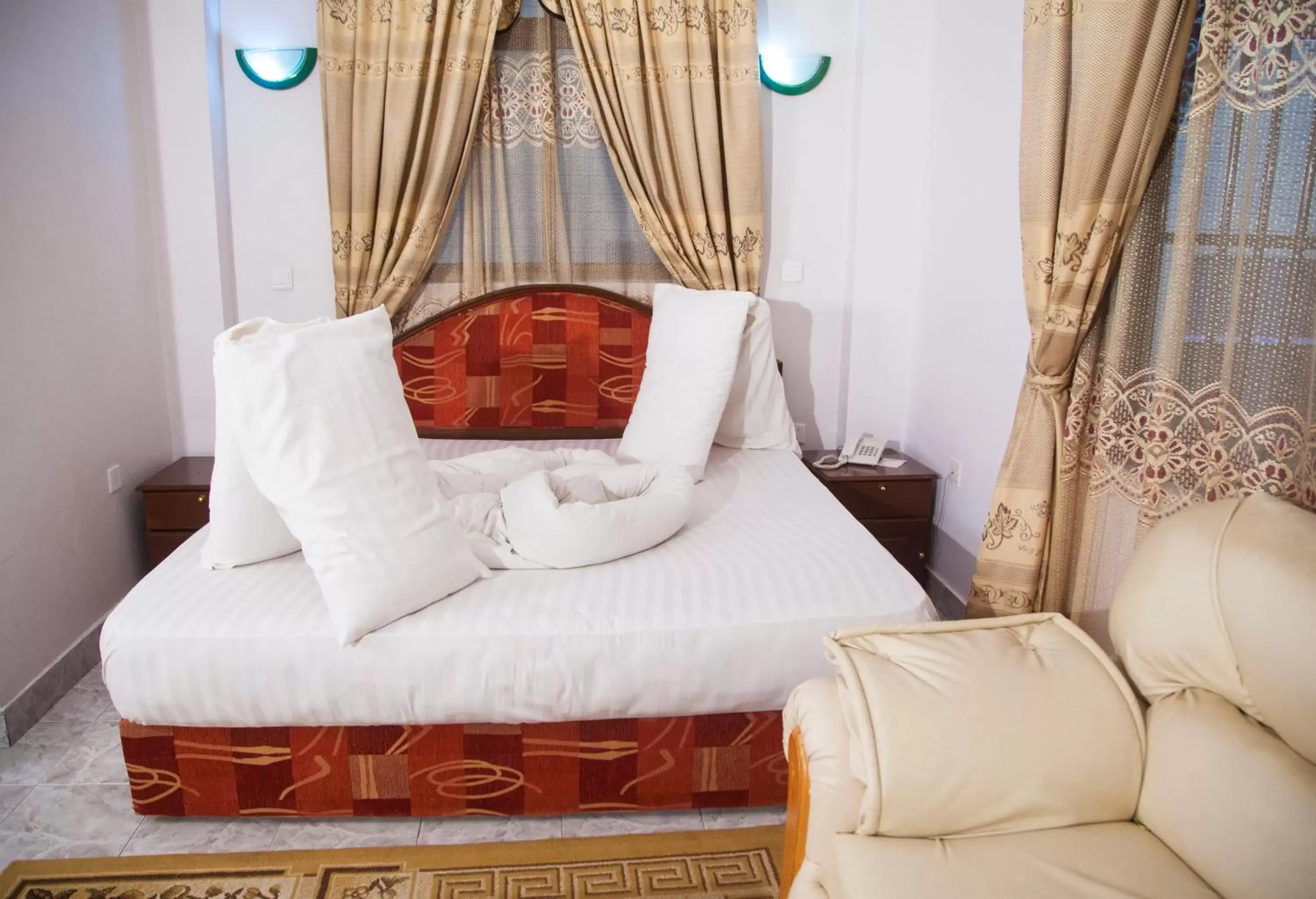 Bed in Natron Palace Hotel