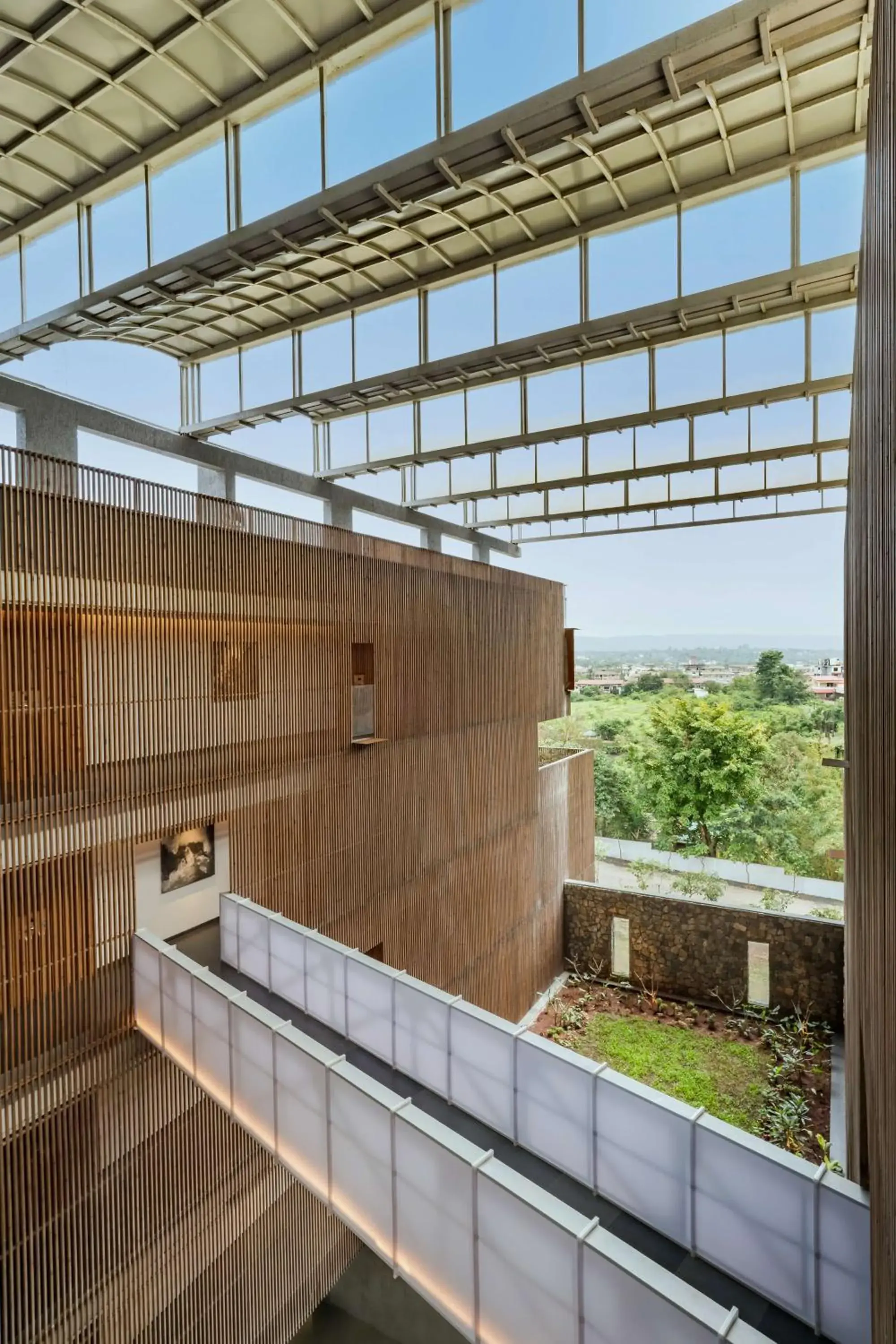 Lobby or reception, Balcony/Terrace in Radisson Resort and Spa Lonavala