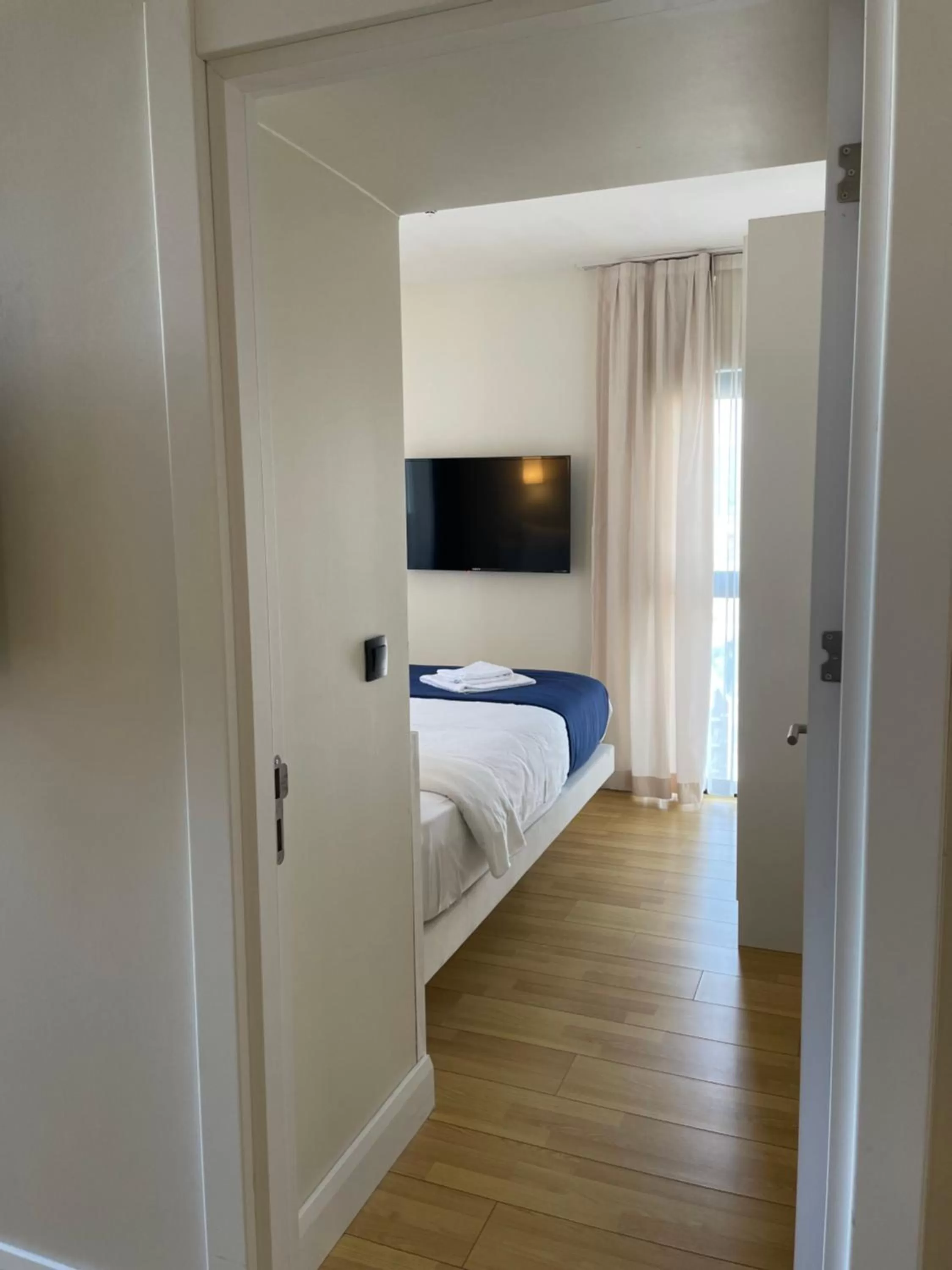 Communal lounge/ TV room, Bed in APARTHOTEL in City Batumi