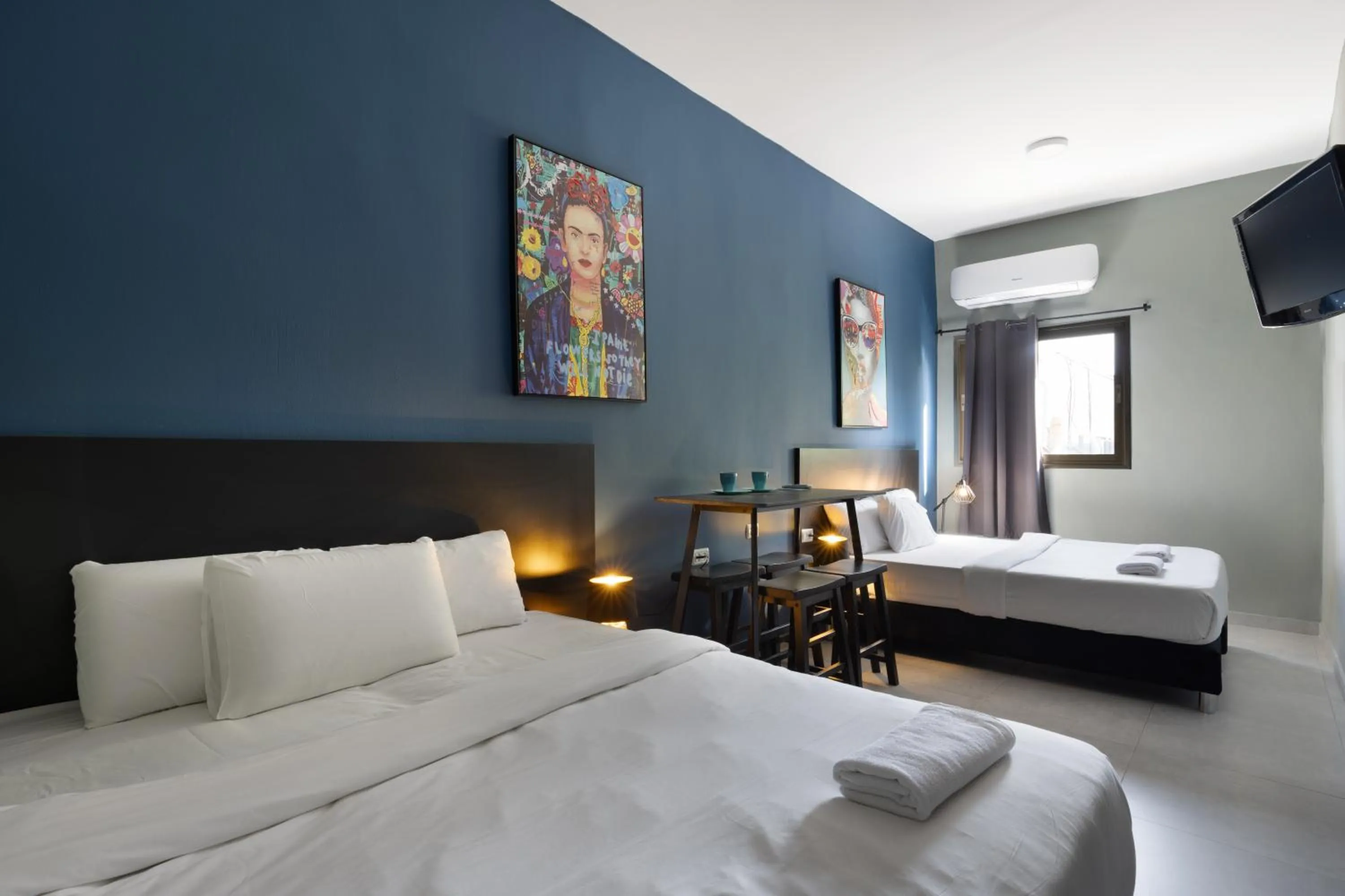 Photo of the whole room, Bed in Liber Tel Aviv Sea Shore Suites BY RAPHAEL HOTELS