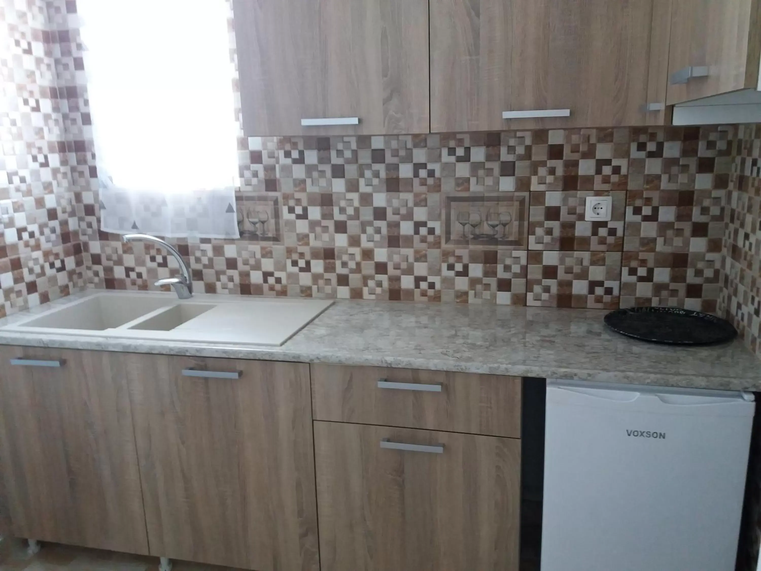 Kitchen/Kitchenette in Nikolakakis Rooms Lavrio