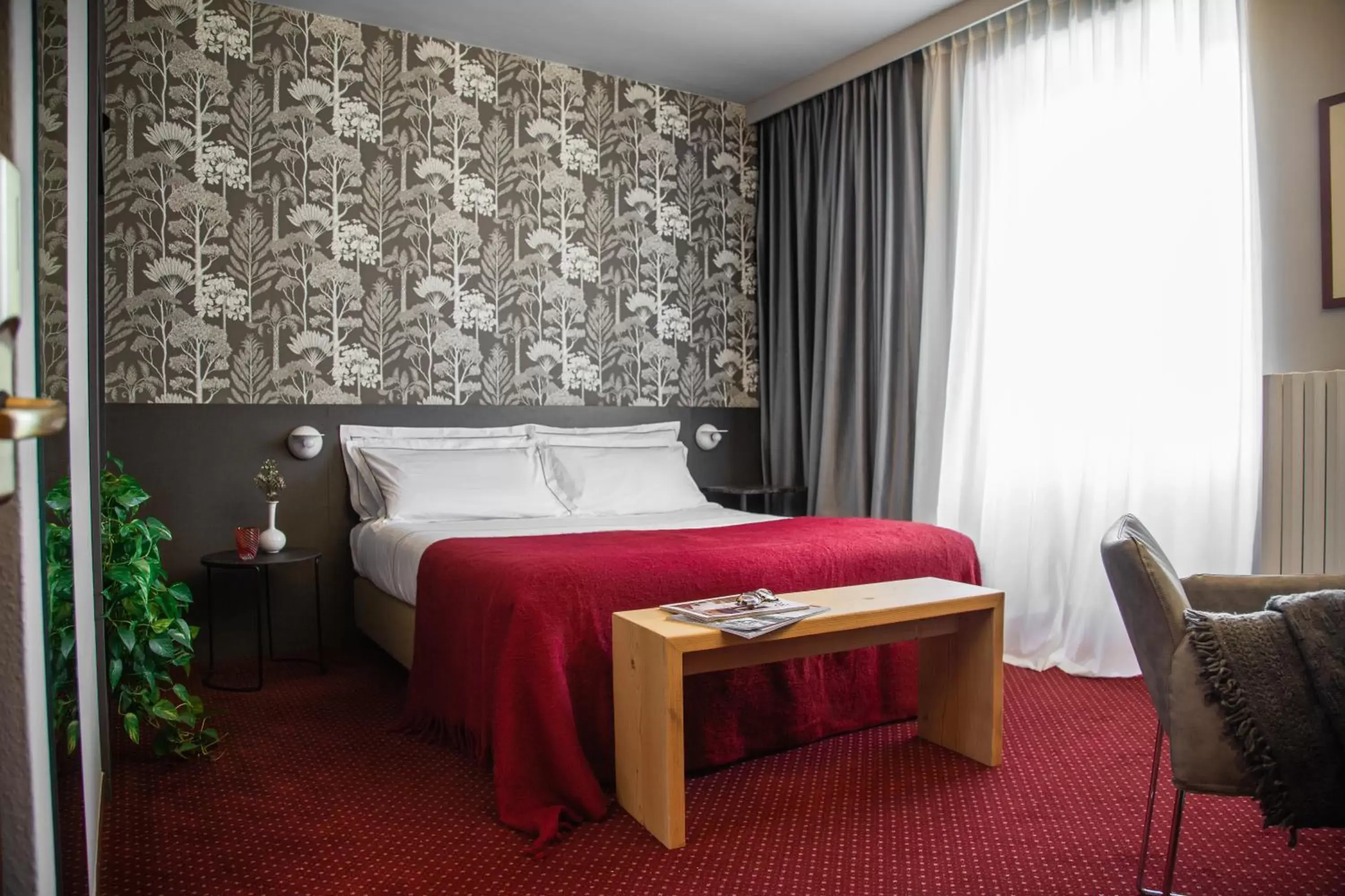 Bed in Hotel Tremoggia Bed in Hotel Tremoggia