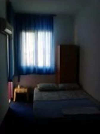 Bed in Sunrise Hotel