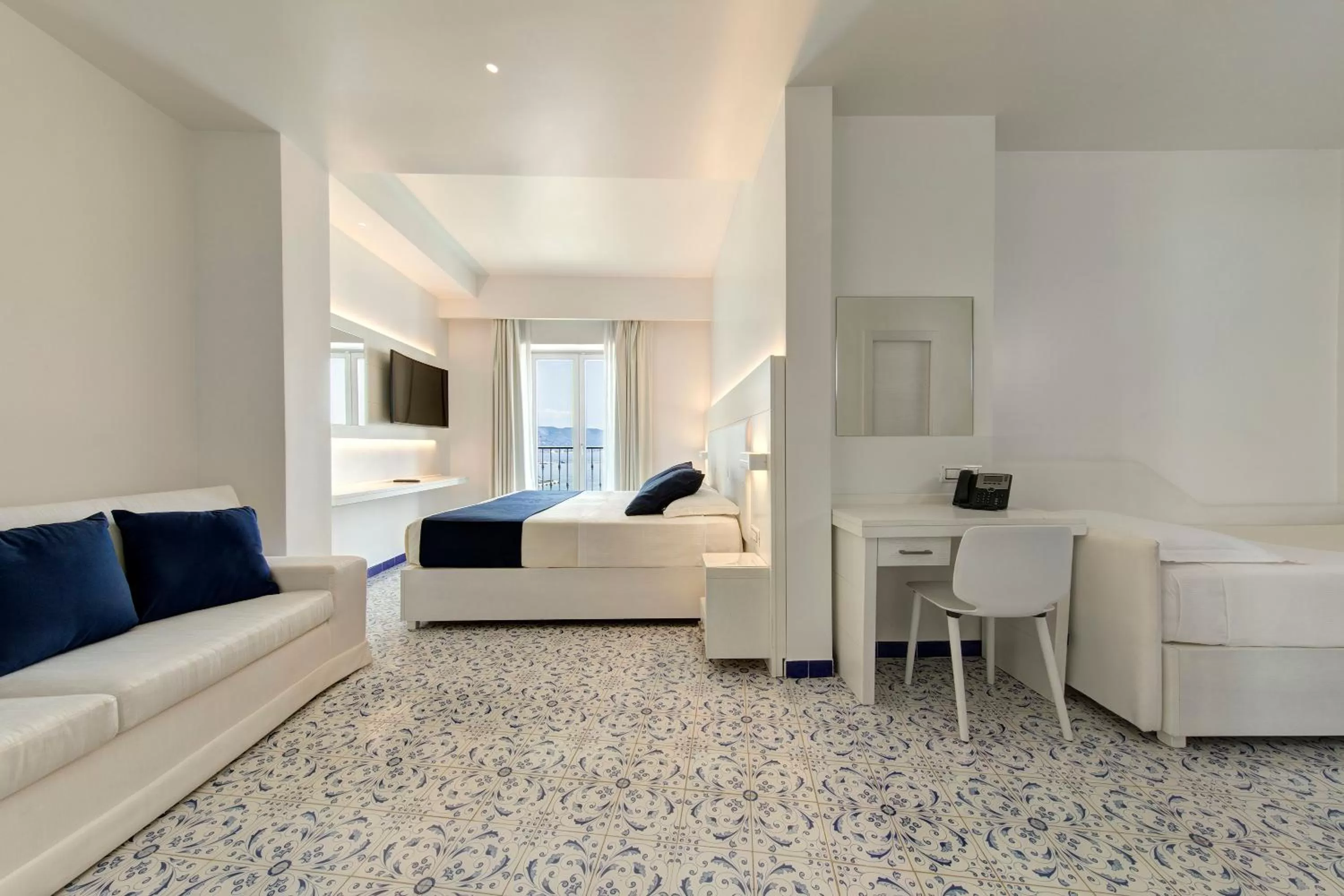 Bed in Lloyd's Baia Hotel