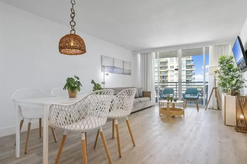 Living room, Dining Area in Beach Apartments by Avi Real Estate