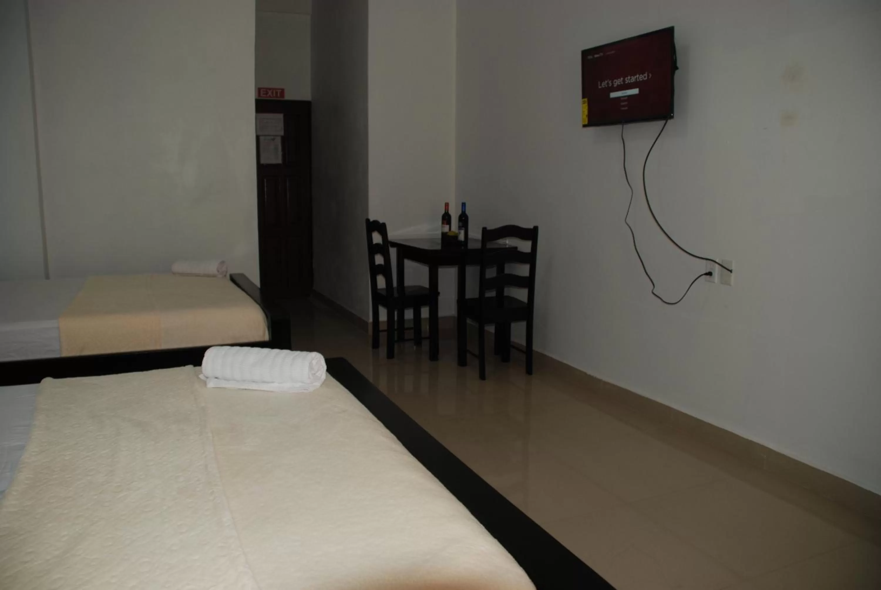 Bed in Hotel Coastalbay 2 & Golf Cart Rental