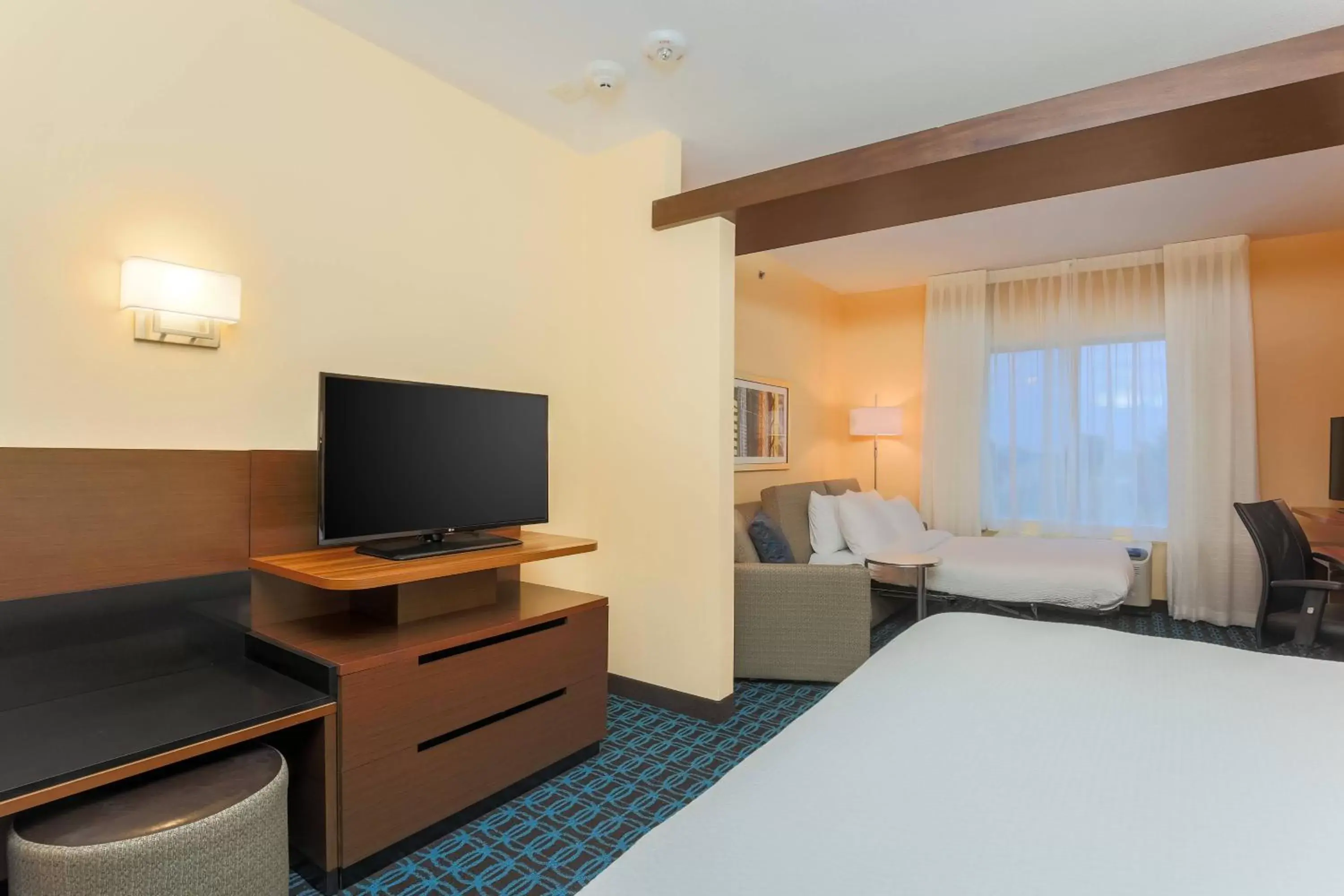 Photo of the whole room, TV/Entertainment Center in Fairfield Inn & Suites by Marriott Cuero