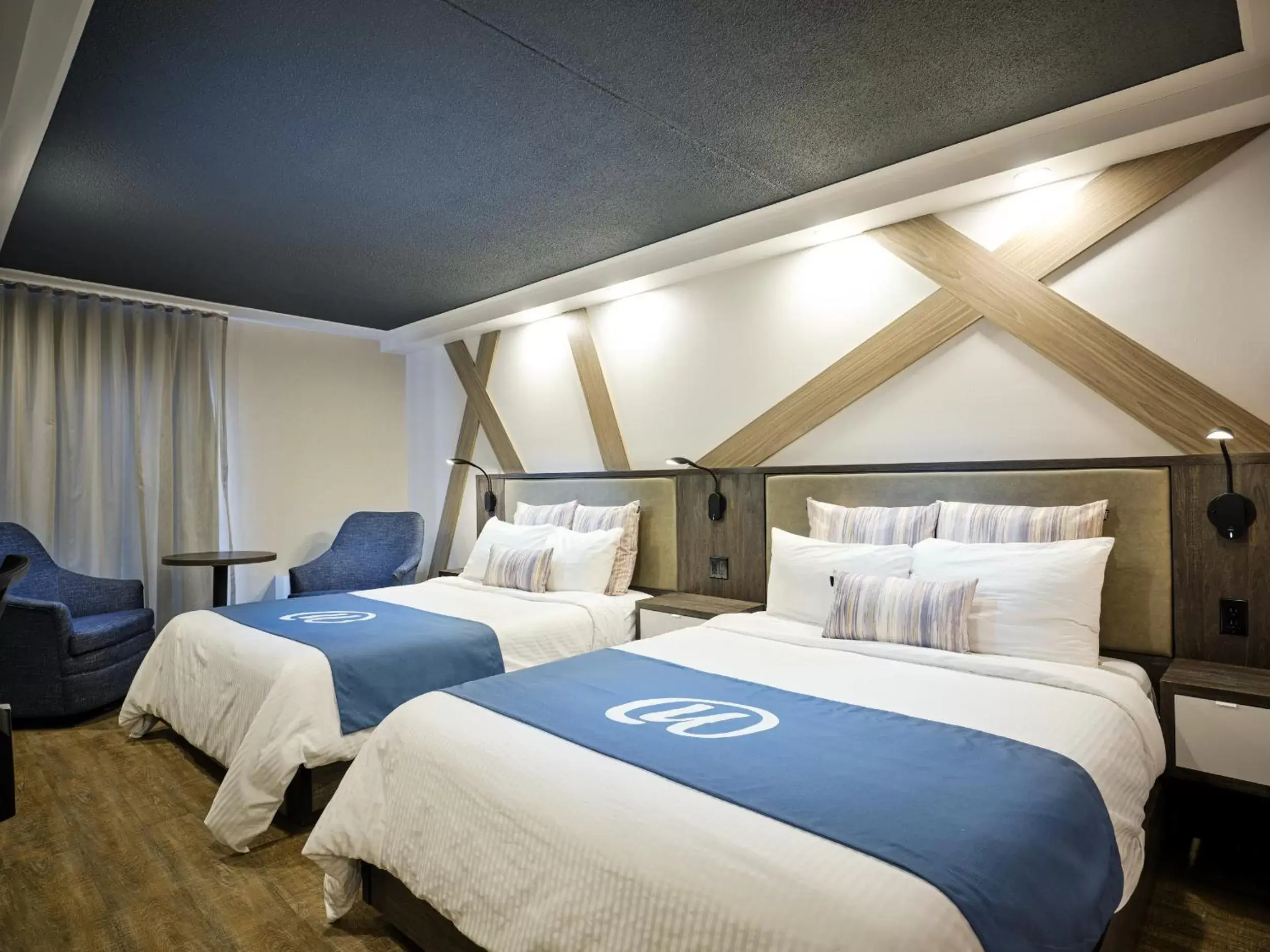 Bed in Hôtel Universel, Centre de congrès Rivière-du-Loup