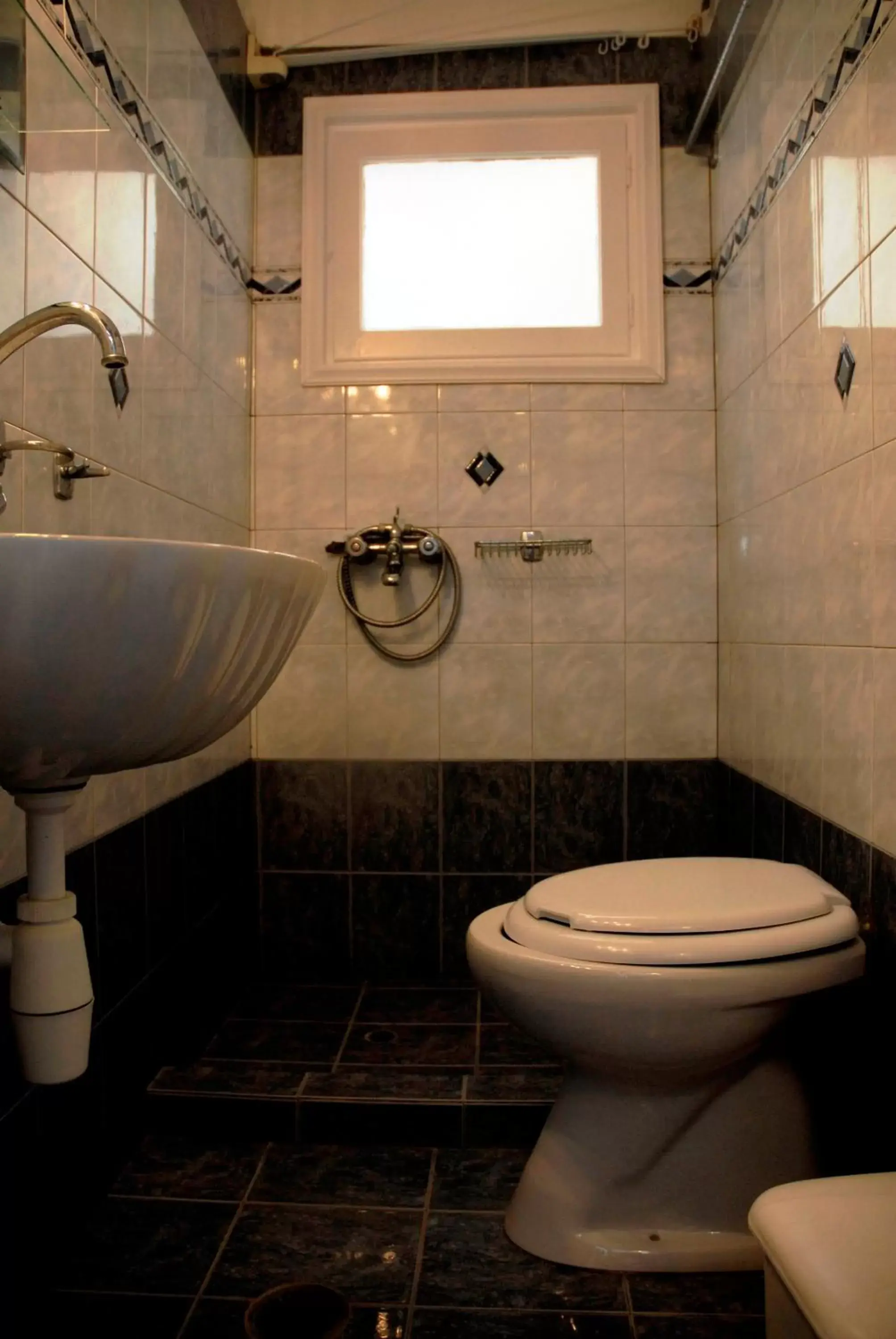 Bathroom in Amaryllis Hotel