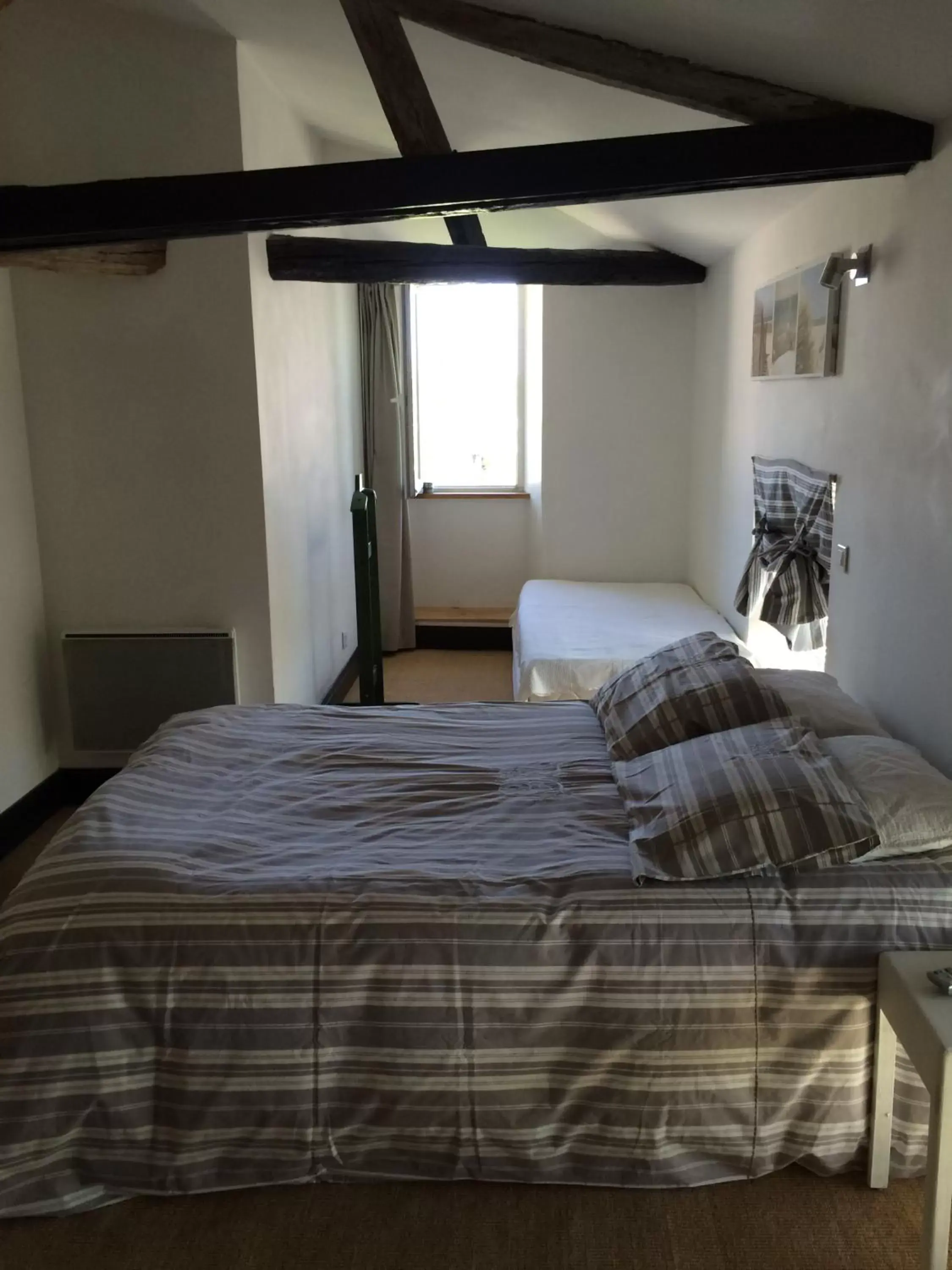 View (from property/room), Bed in Le Mole (Appartements et Chambres)