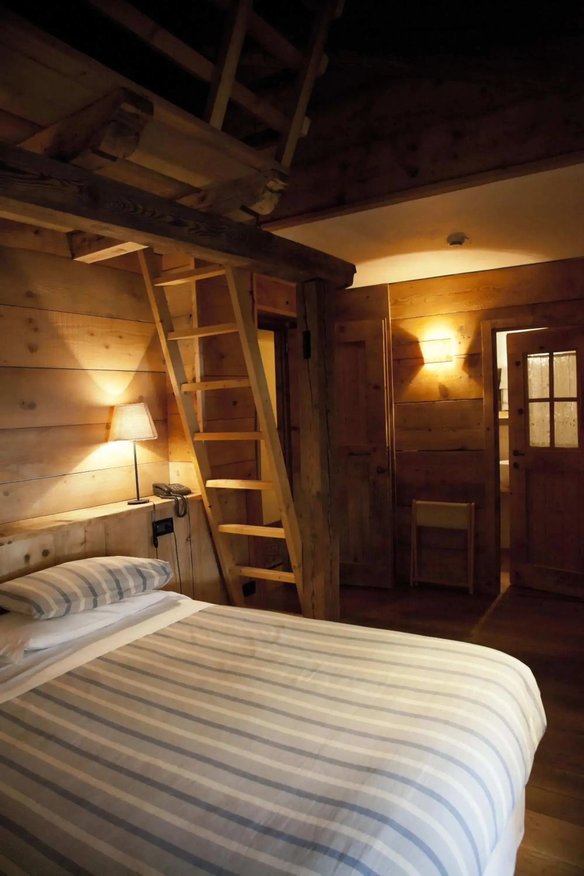 Photo of the whole room, Bed in Hotel Chalet Svizzero