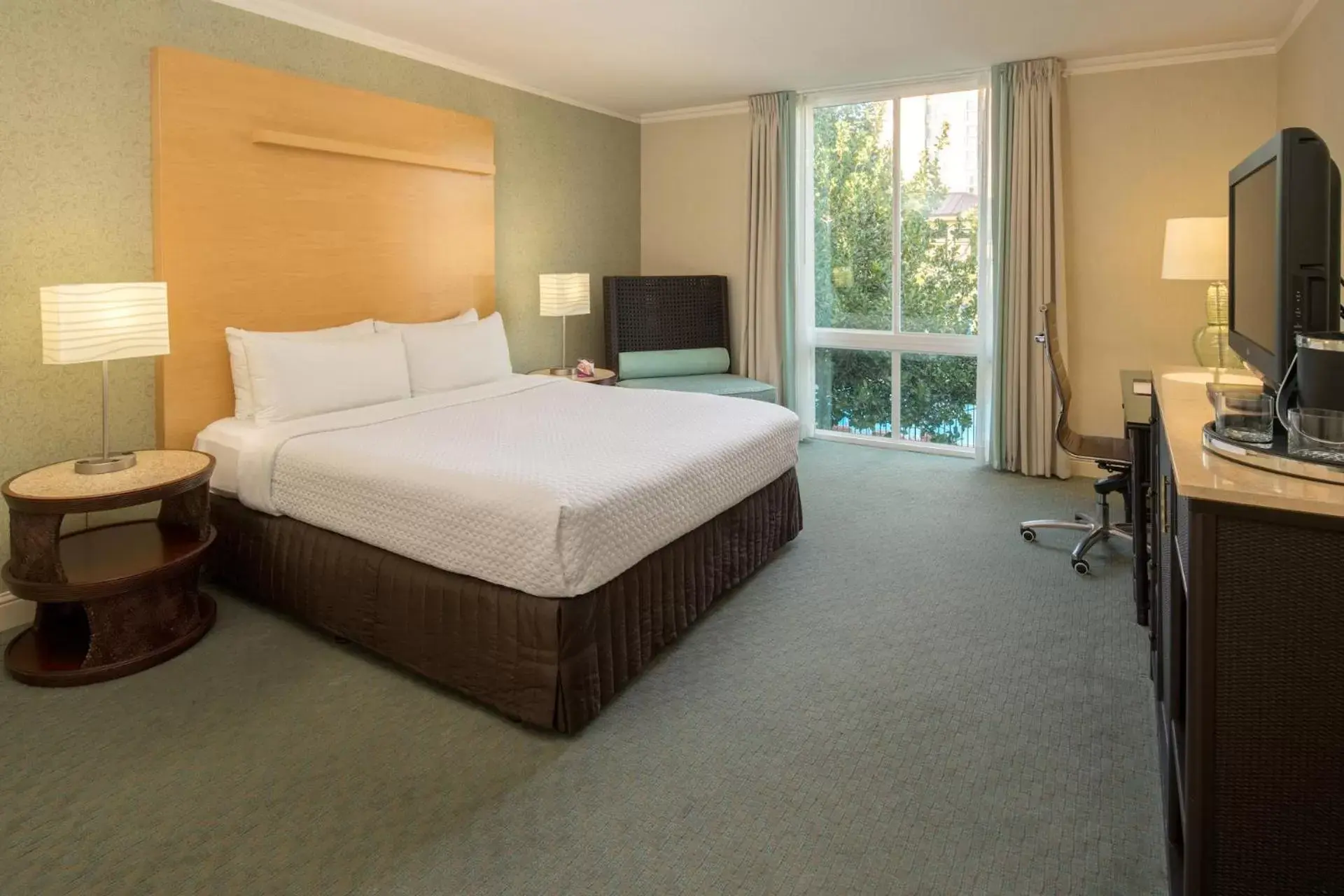 Bed in Crowne Plaza Cabana Hotel, an IHG Hotel