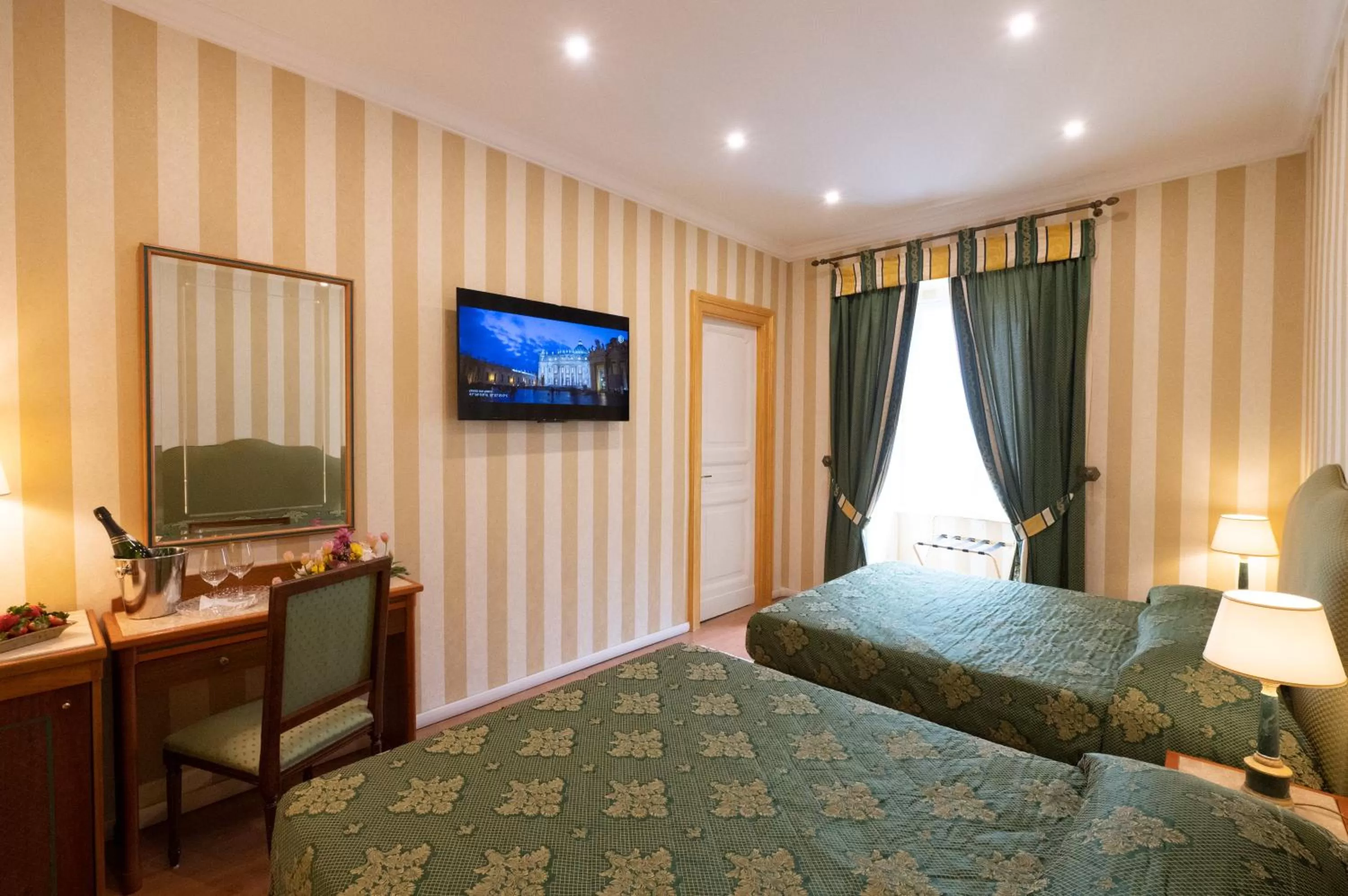 Photo of the whole room, TV/Entertainment Center in B&B Venus Inn